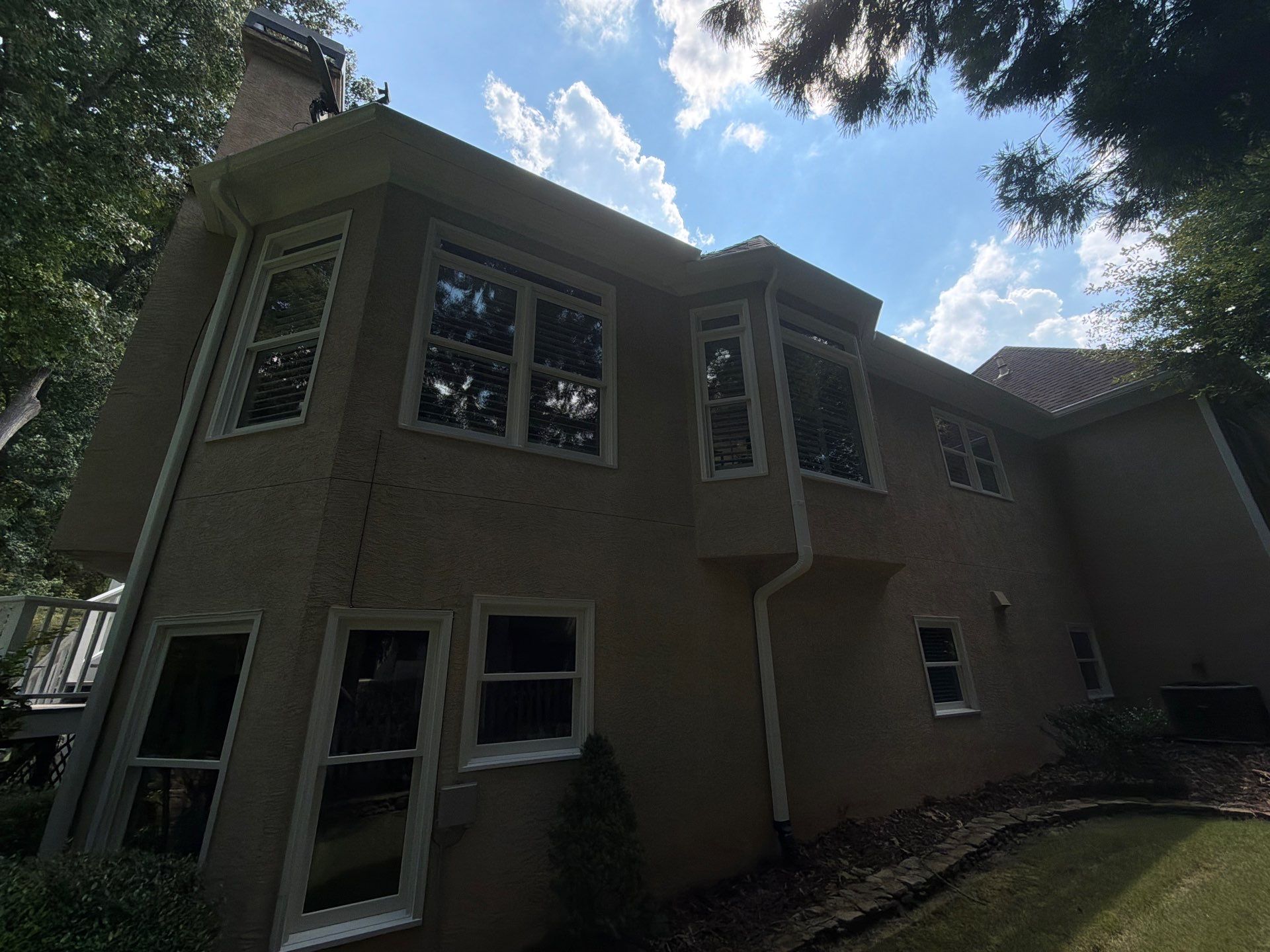 Multi-Story Stucco Home Exterior Painting and Garage Refresh in Marietta by Swift Home Renovations 