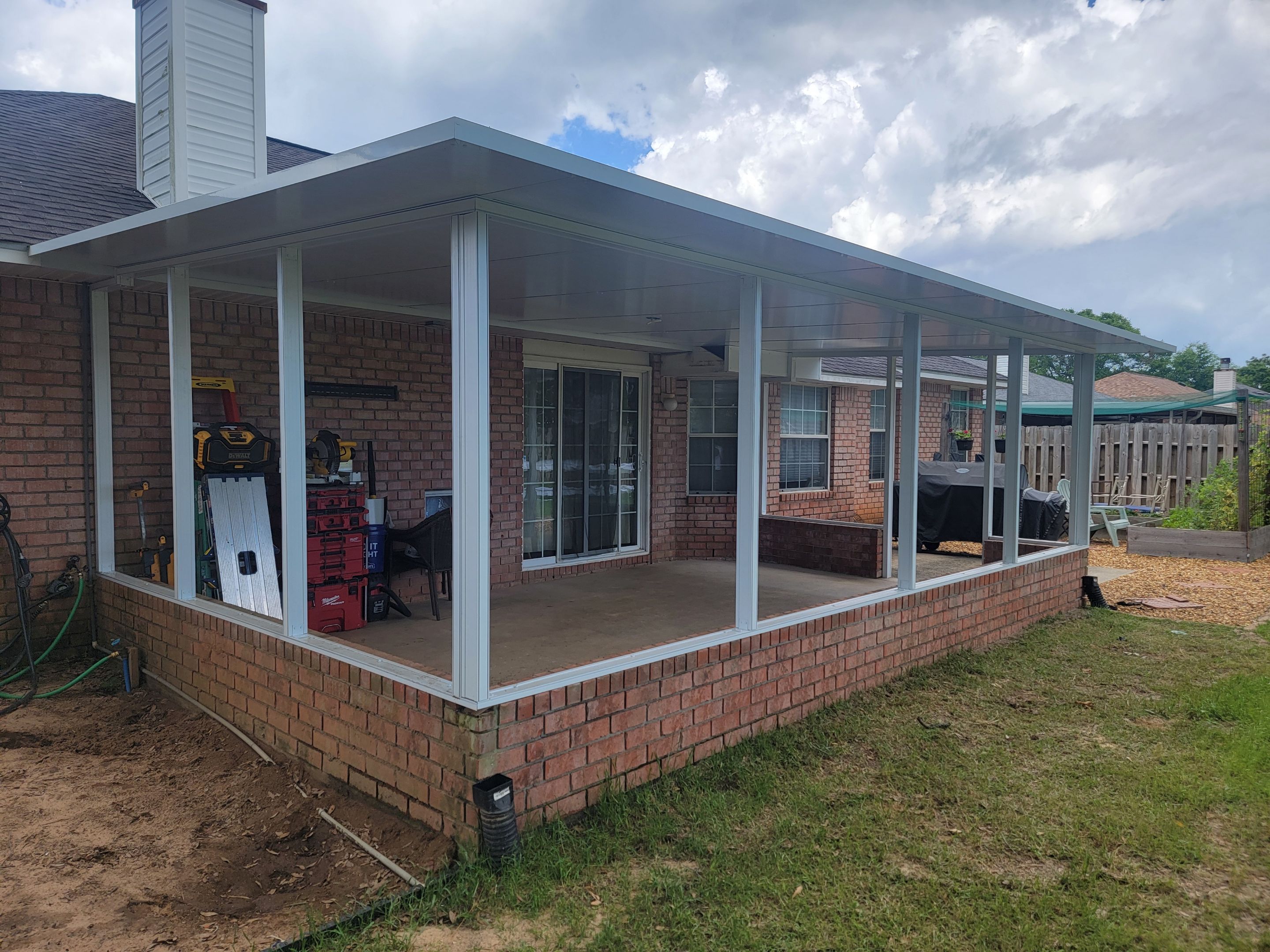 Screen Room in Milton w/Brick Kneewall by Titan Sunrooms