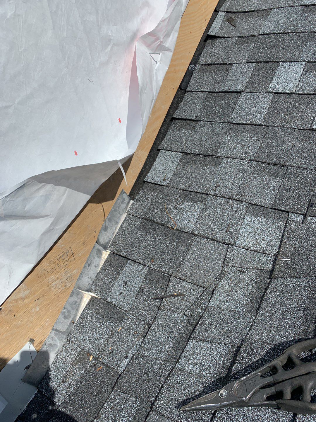 Commercial Roofing Installation using EPDM with white gutters by A Plus Exterior