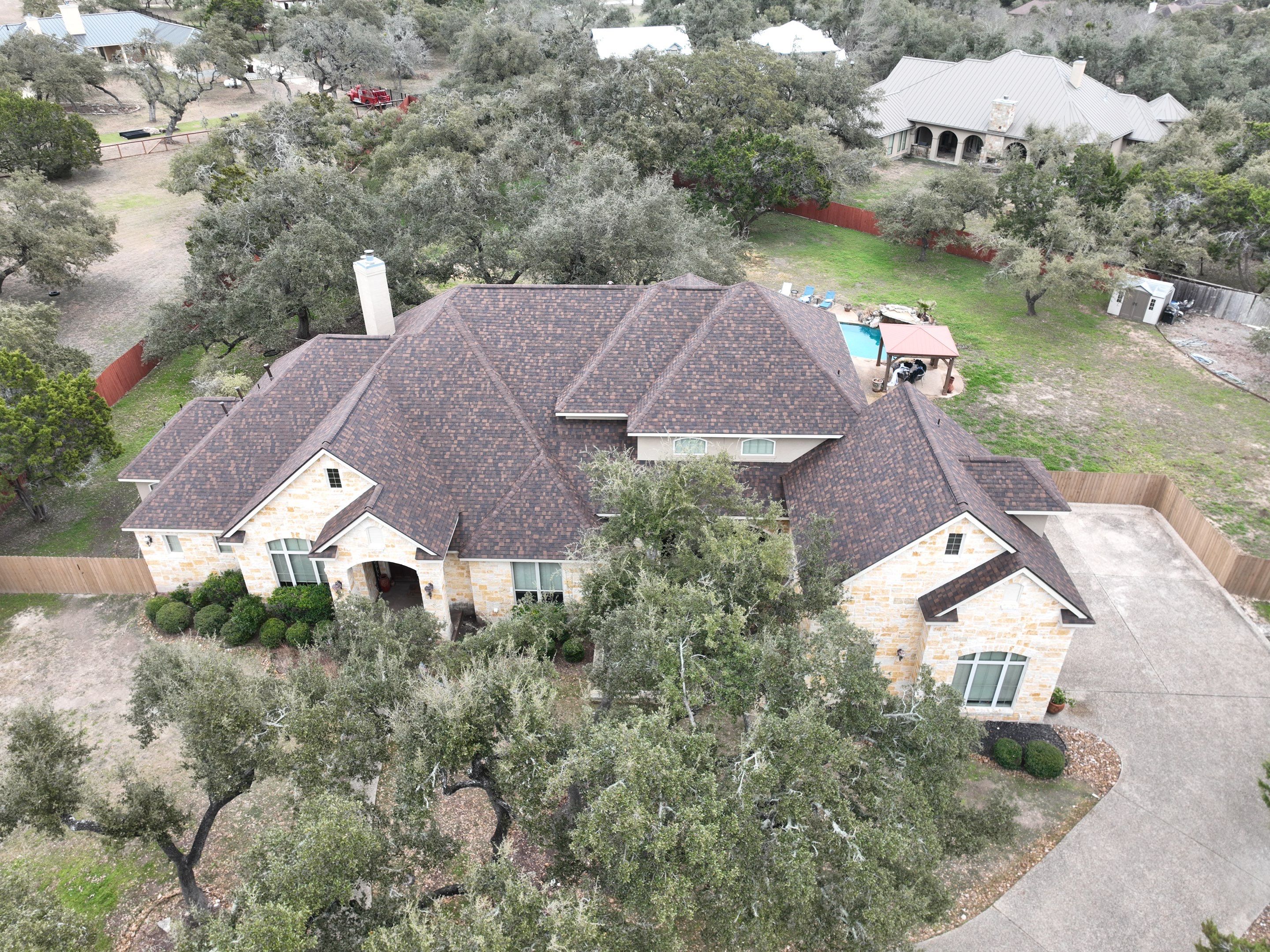 Residential Roof Replacement using 30 Year Laminate Shingles with High Profile Ridge by Premier Roofing and Contracting
