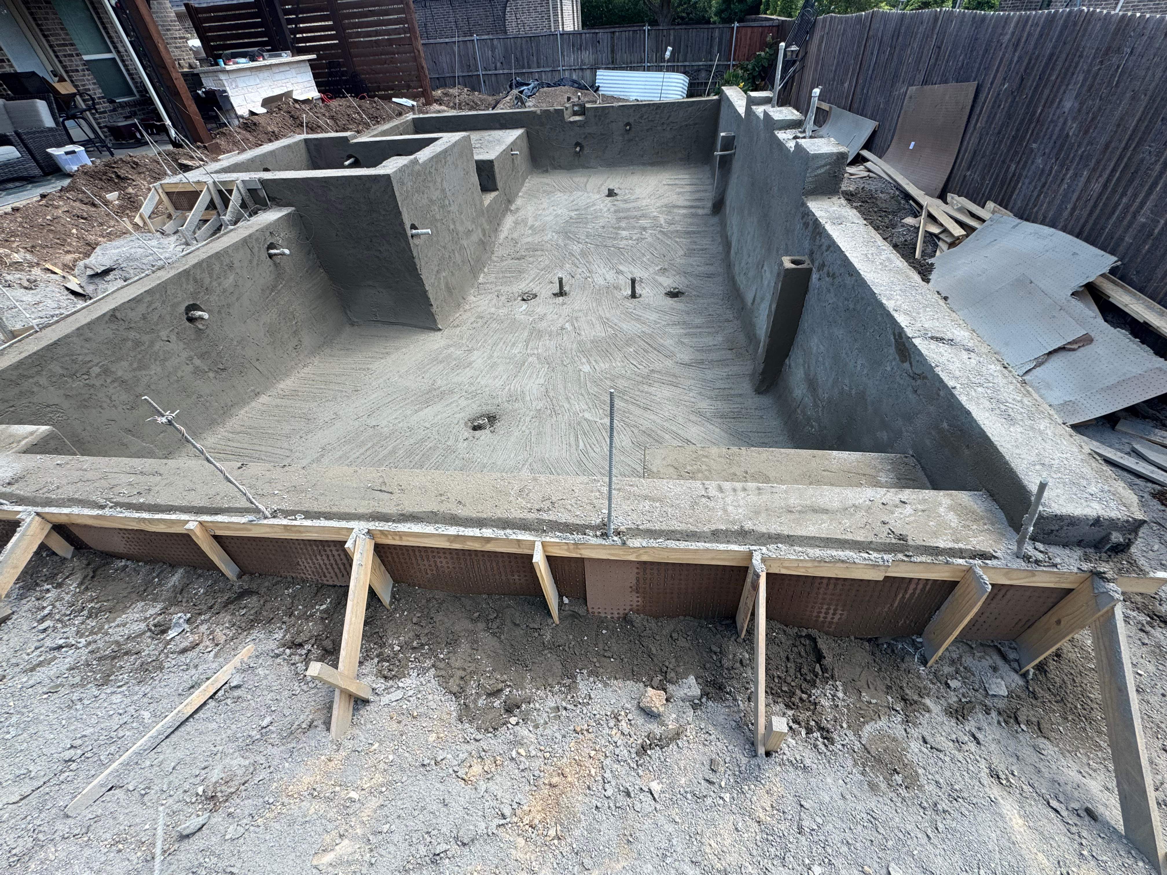 Geometric Pool with Raised Spa and Tanning Ledge by Pinnacle Pools and Spas - DFW