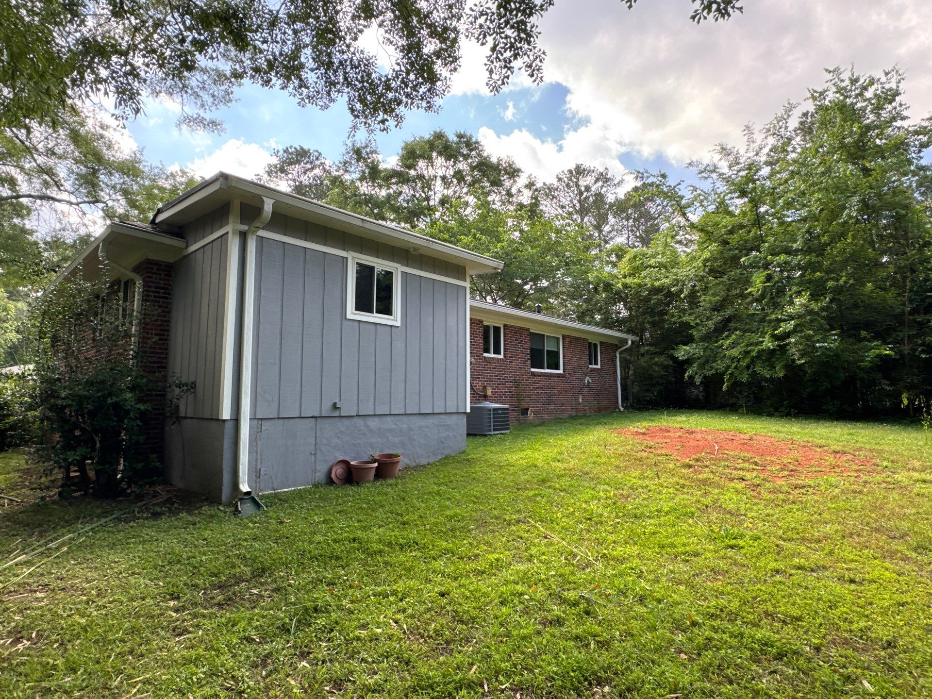 Full Exterior Painting and Brick Transformation in Oxford by PGP Surface Solutions, LLC