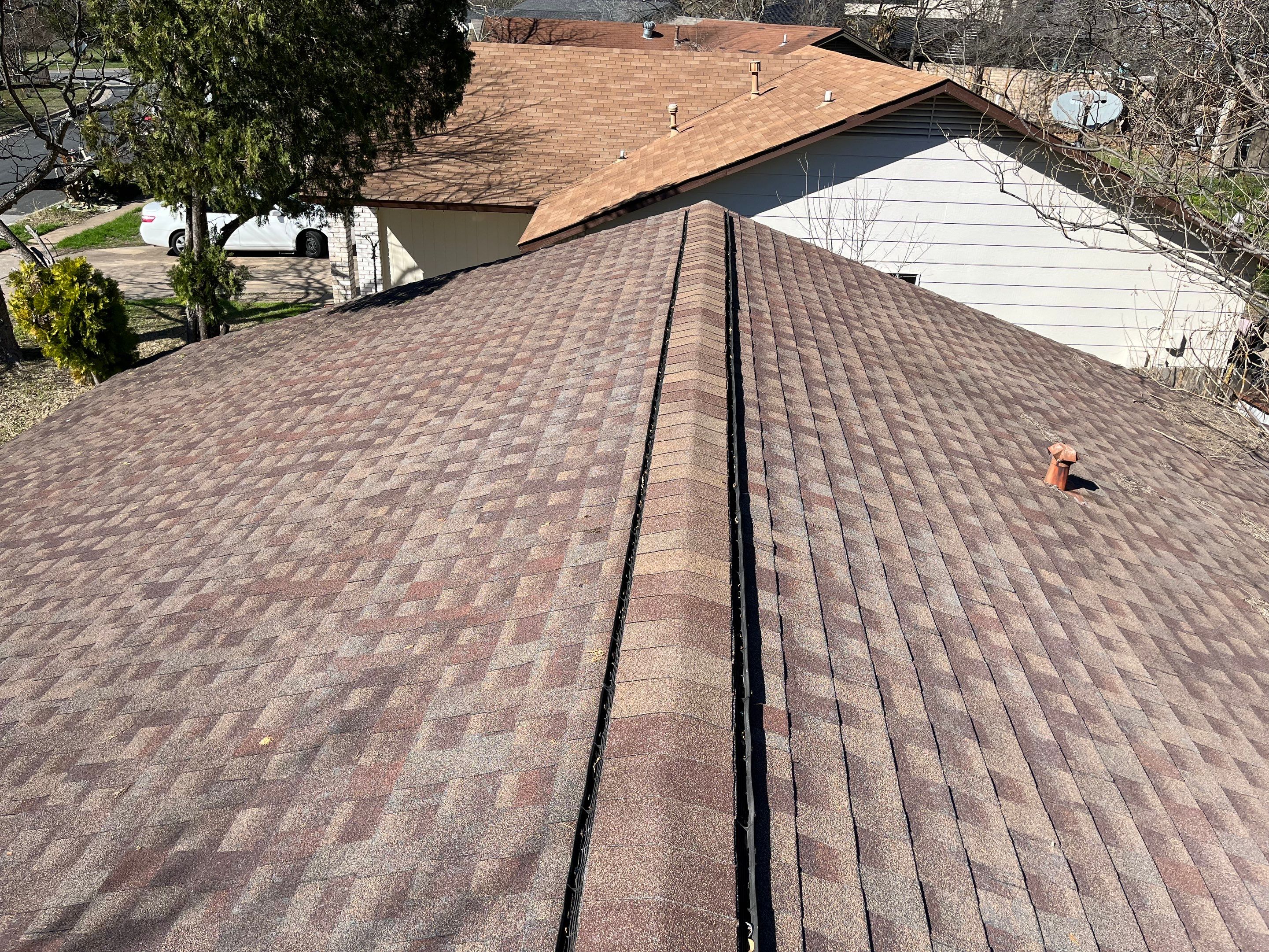 Estate Gray Shingles by Reimagine Roofing
