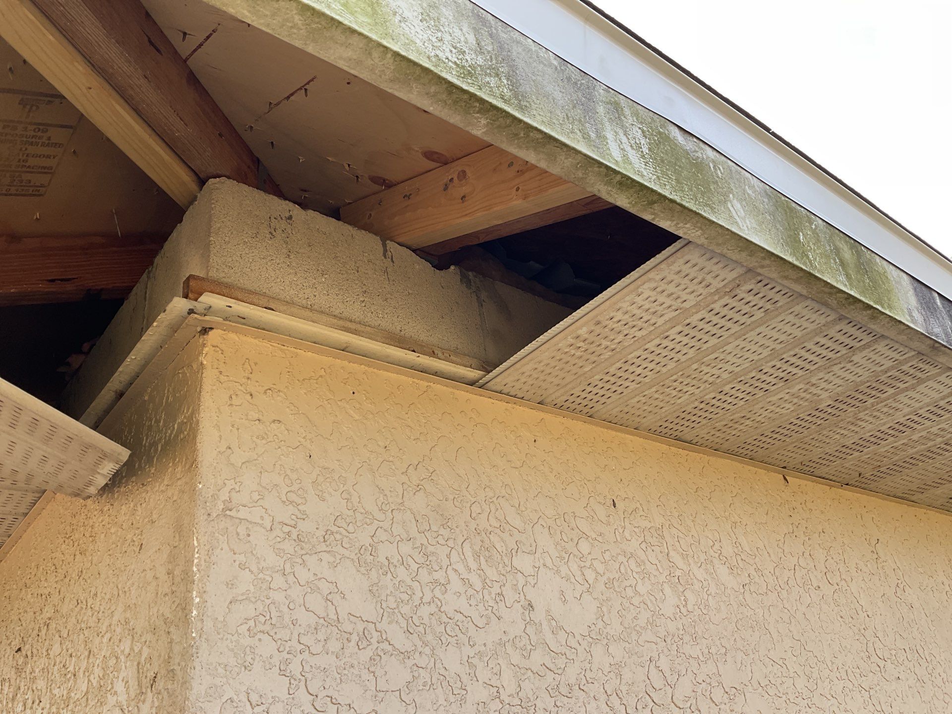 White Seamless Gutters and Soffit Installation in Cape Coral FL by Gutter Professors