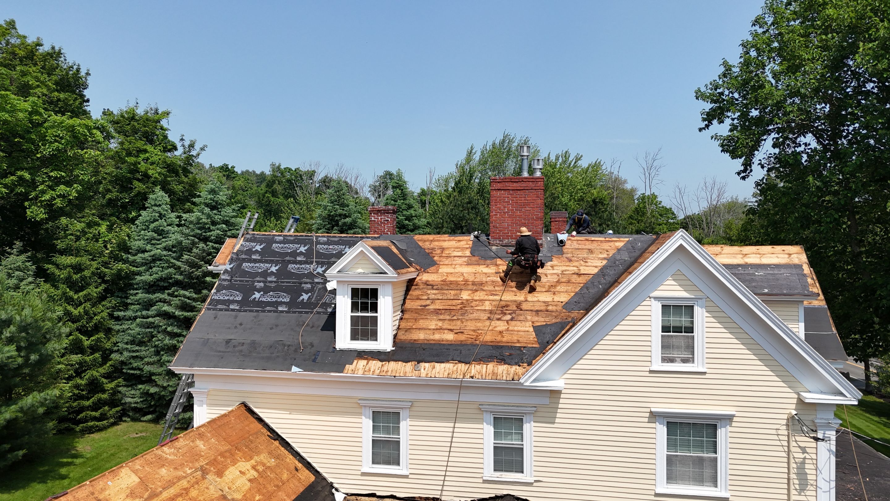 Full Roof Replacement & EPDM Restoration – North Andover, MA by Mighty Dog Roofing of Greater Middlesex County