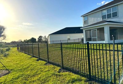 Aluminum Fence Installation using Black 3 Rail Aluminum Fence