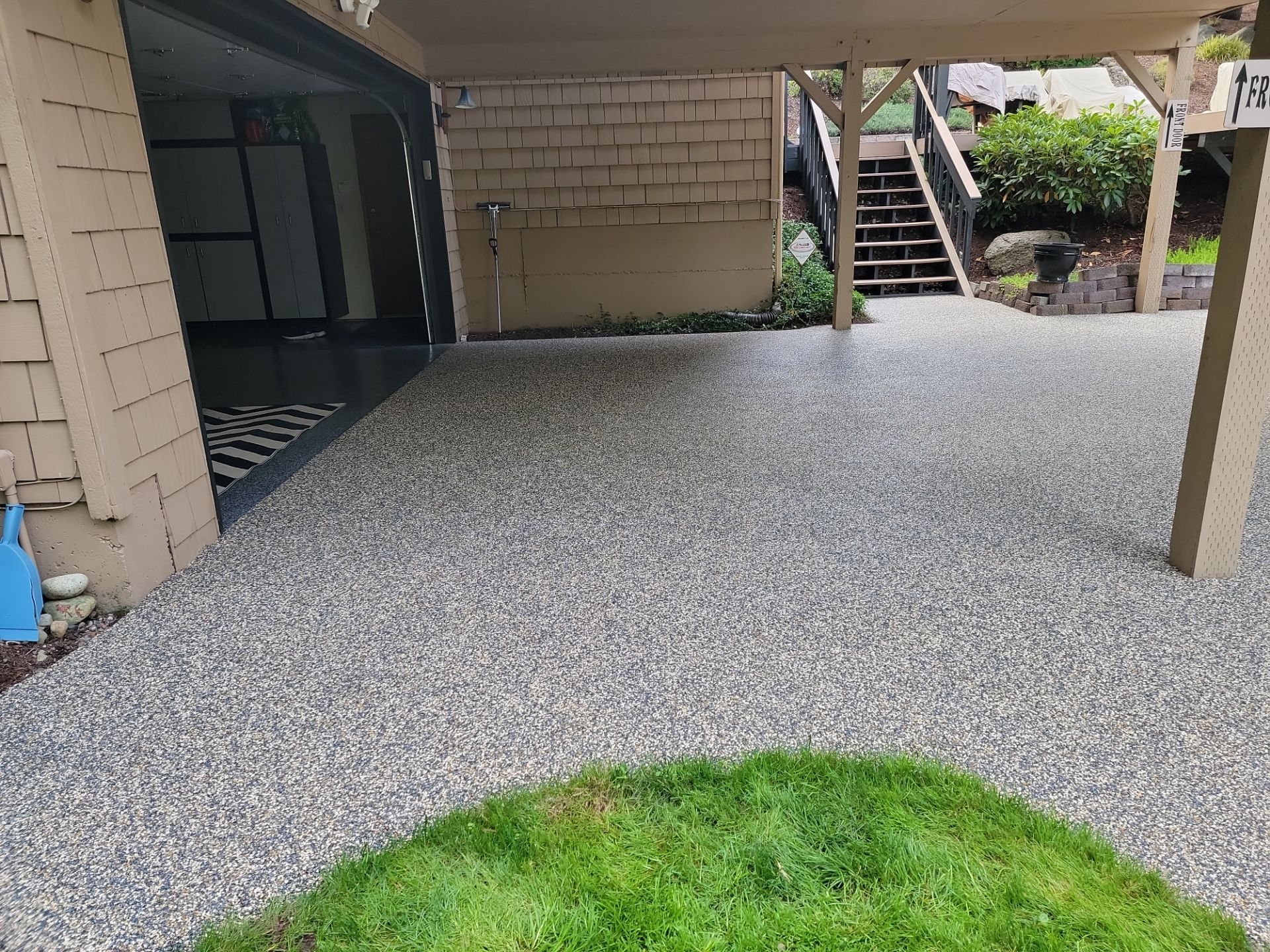 Walkway and driveway by Concrete Coating Experts Inc.