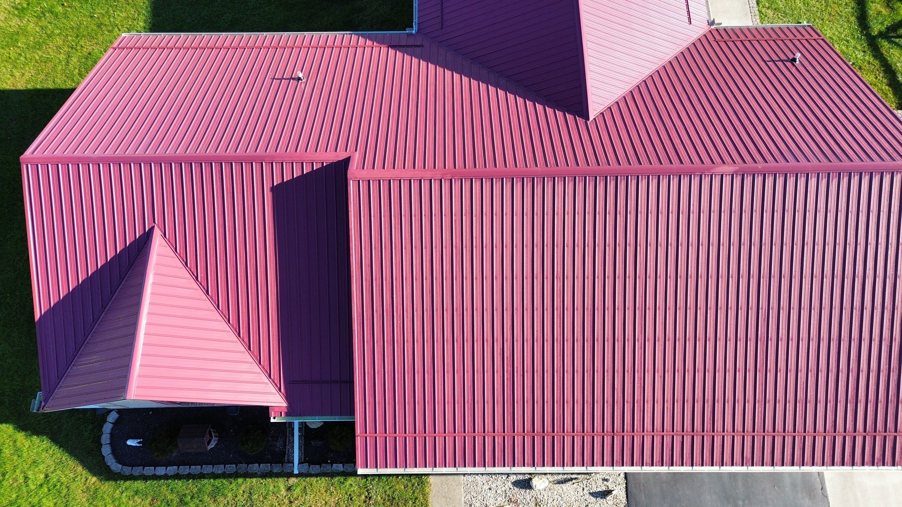 Residential Roofing Installation using Performance Panel Metal - Burgandy by RoofX 
