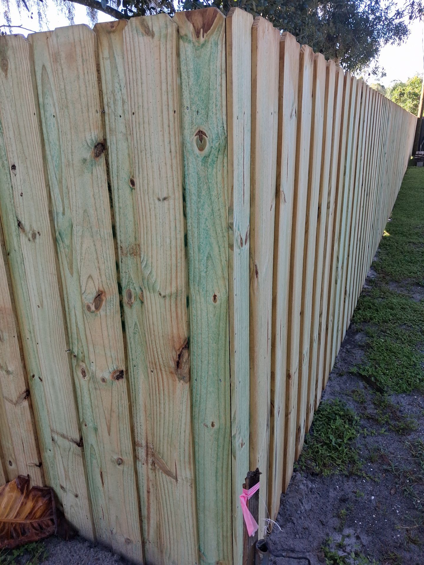 Pressure-Treated Wood Privacy Fence and Gate Installation in North Port by True Fence LLC