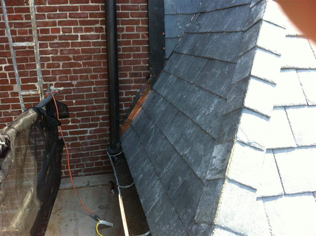 Historic Building ROOF REPLACEMNT with GAF TruSlate  on steep slop and Versico 60mil TPO on flat roof by Gorilla Exteriors Contracting, LLC