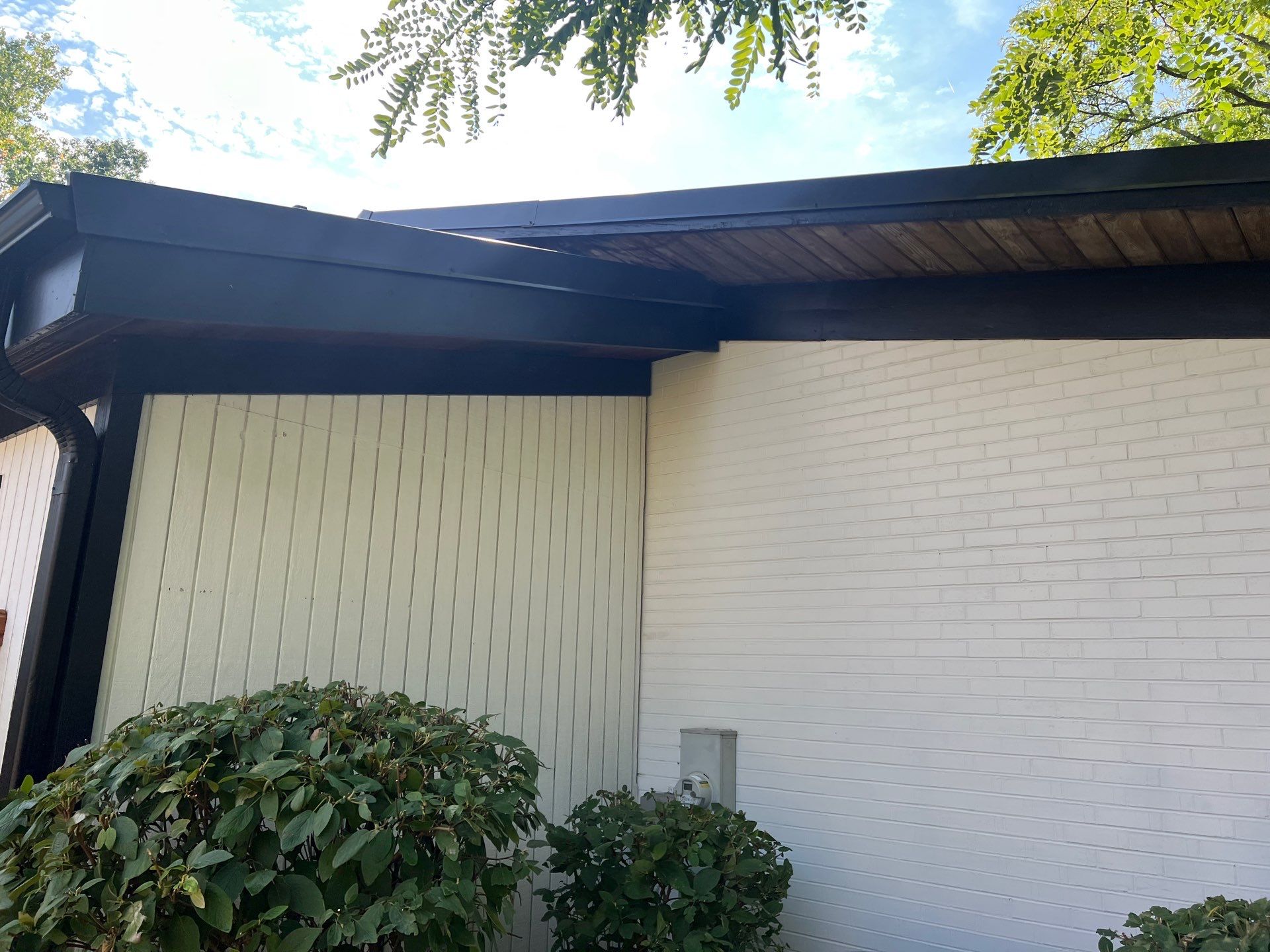 Complete Exterior House, Bluestone & Garage Floor Cleaning by Northern Power Washing LLC.