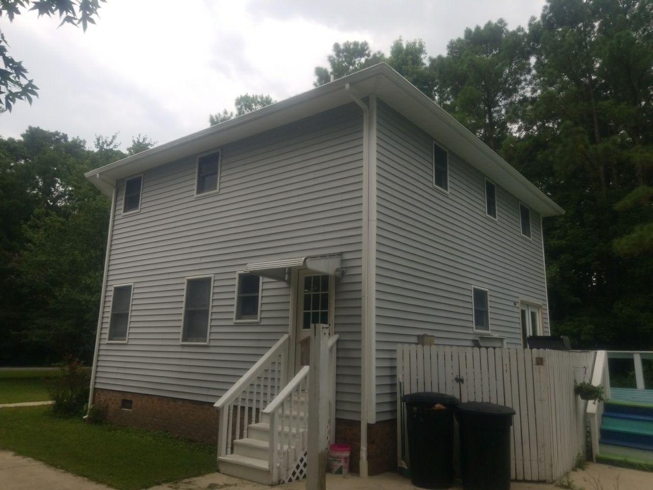 Hughes - Gutter 107 Maid Marian Court • Manteo, NC 27954 by Gallop Roofing & Remodeling, Inc.