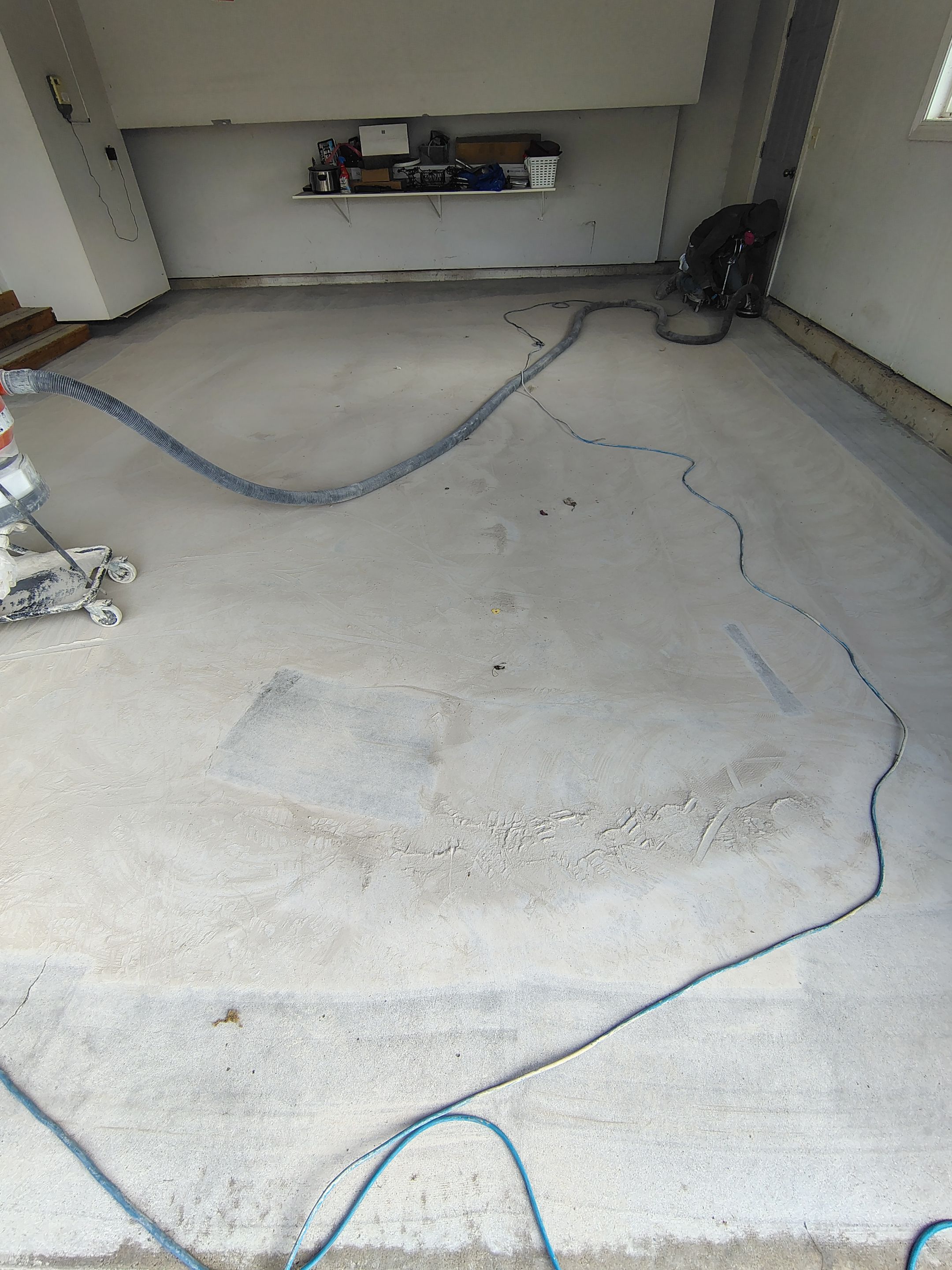 Decorative Chip Epoxy Garage Floor Coating in Sioux Falls by Select Painting, Coatings & Garage Cabinets