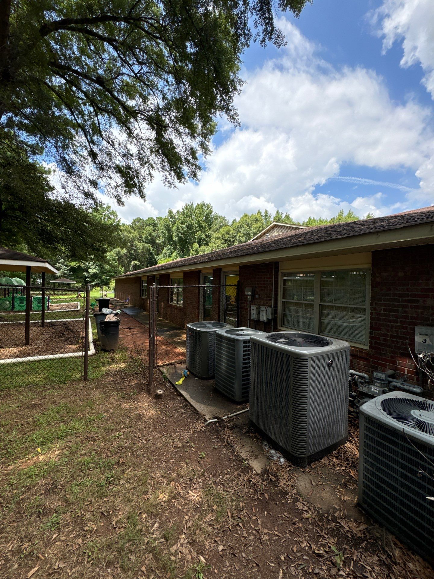 Commercial Exterior Brick and Stucco Painting in Fayetteville by Swift Home Renovations