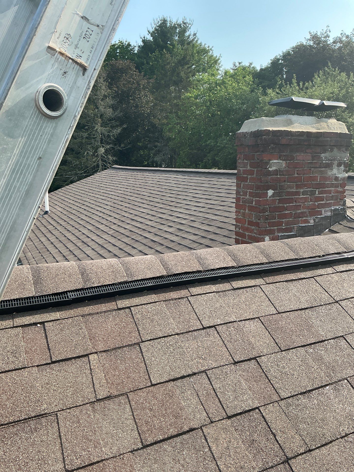 Full Roof Replacement & Chimney Repair – Onyx Black, MA by Mighty Dog Roofing of Greater Middlesex County