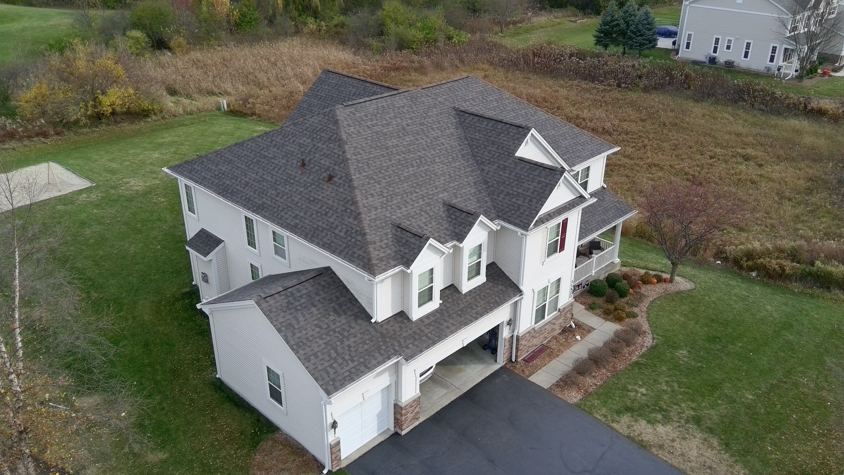Re-roof: IKO Dynasty in DriftShake by Midwest Building Solutions