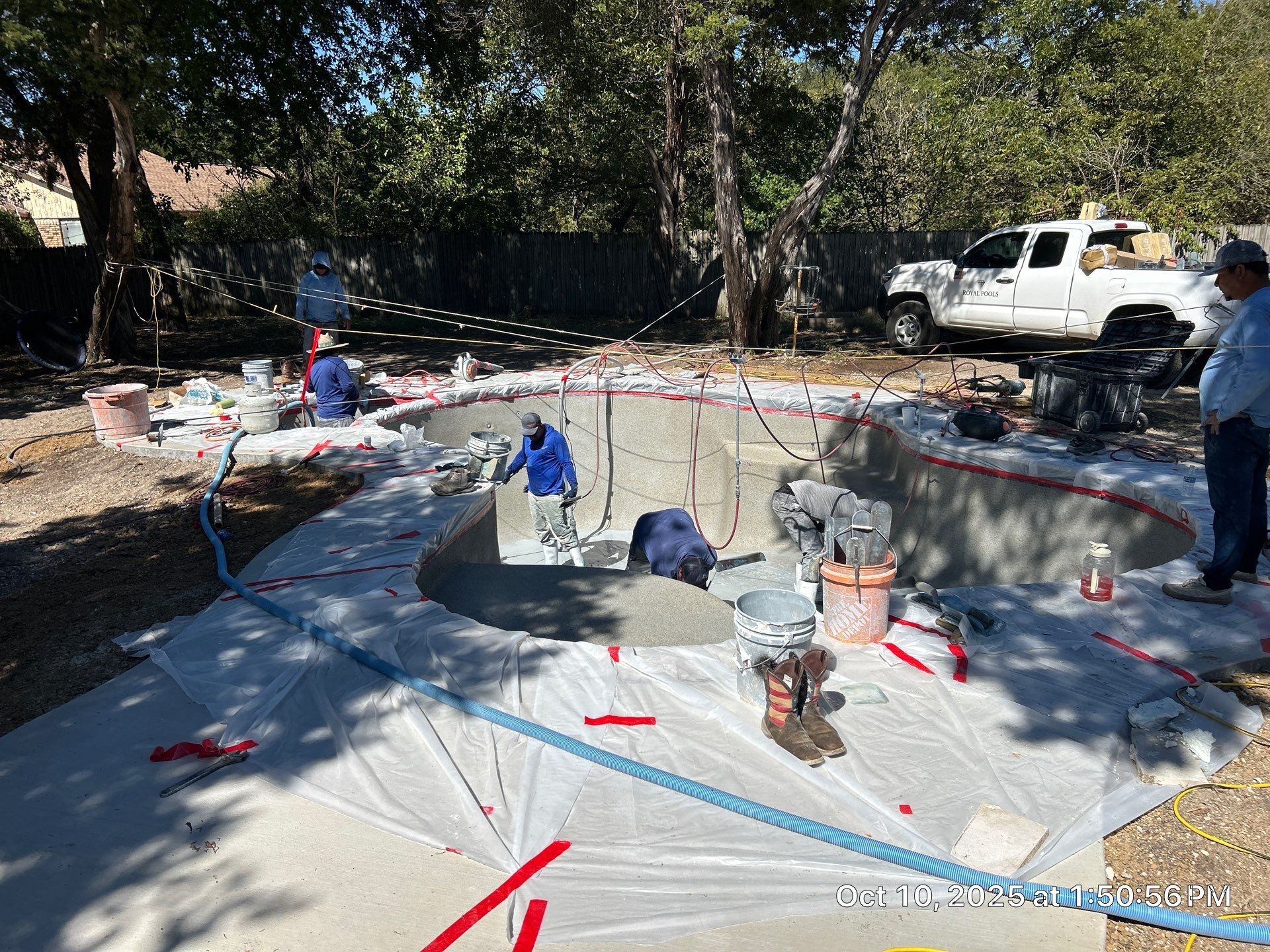 Freeform Pool Remodel with New Decking and Pebble Interior by Pinnacle Pools and Spas - DFW