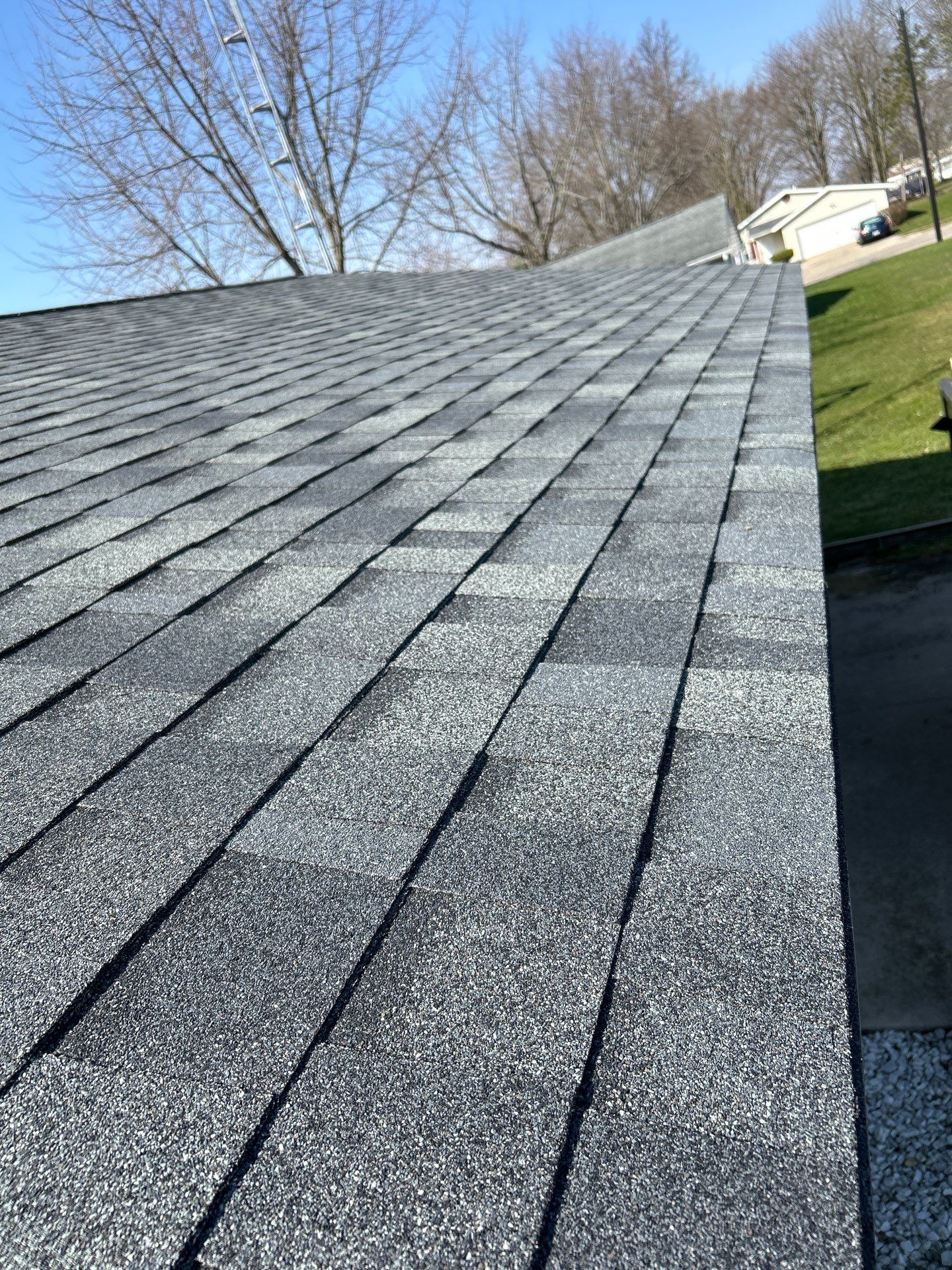 Storm Damage Residential Roof and Siding Installation by WIW Enterprises Inc