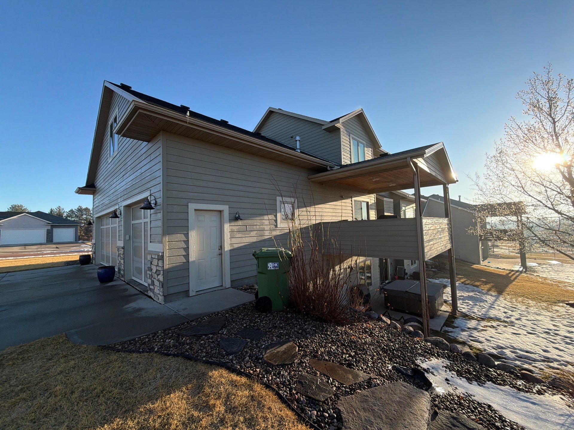 Residential Exterior Painting and Color Update in Sioux Falls by Select Painting, Coatings & Garage Cabinets