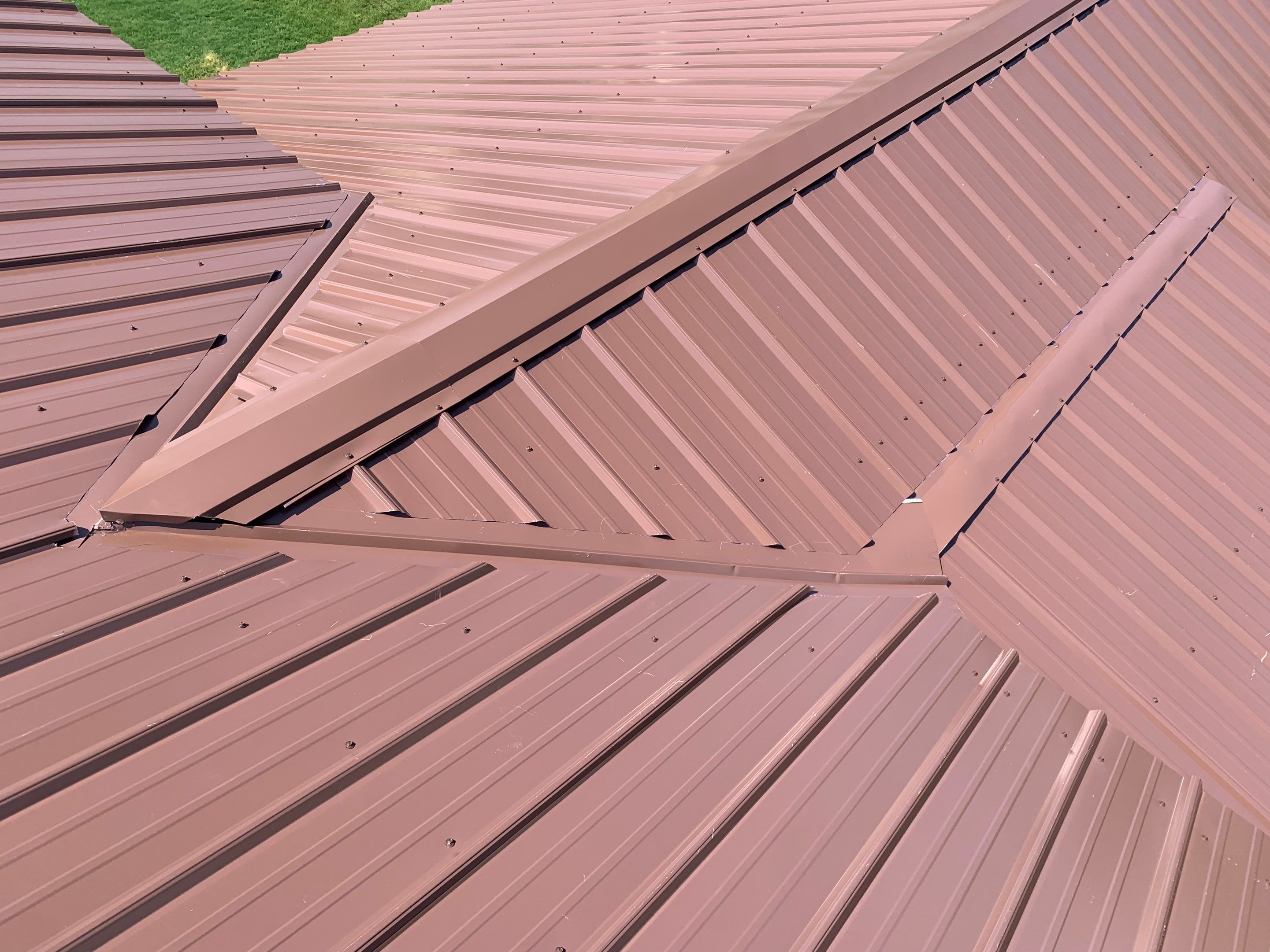 Residential Roofing Installation using 26 Gauge Metal by The Roofing Dudes
