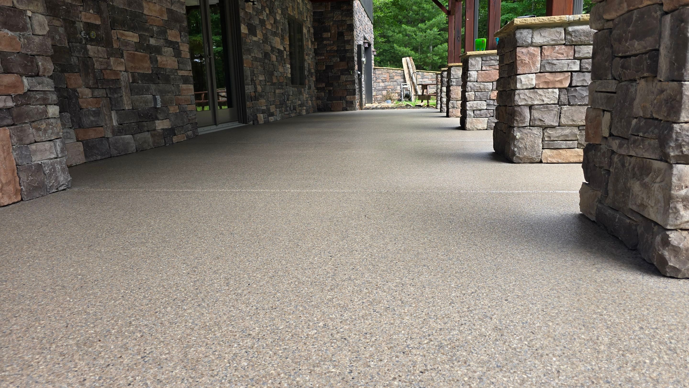 Patio using Obsidian by Elite Floor Solutions