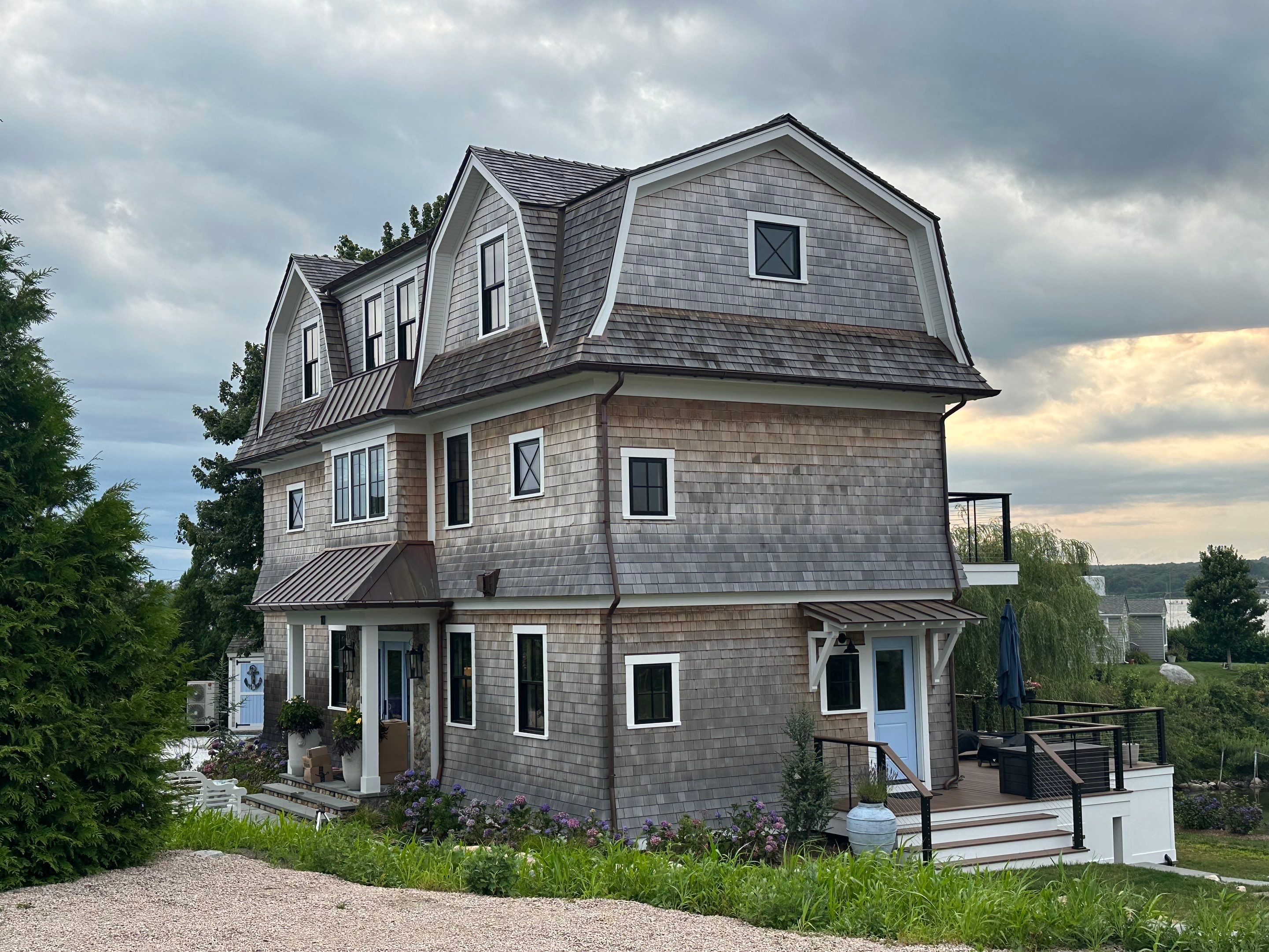 Great Island - Red Cedar Roofing, Yellow Cedar Siding, Standing Seam Copper, & Copper Gutters by Rinaldi Brothers