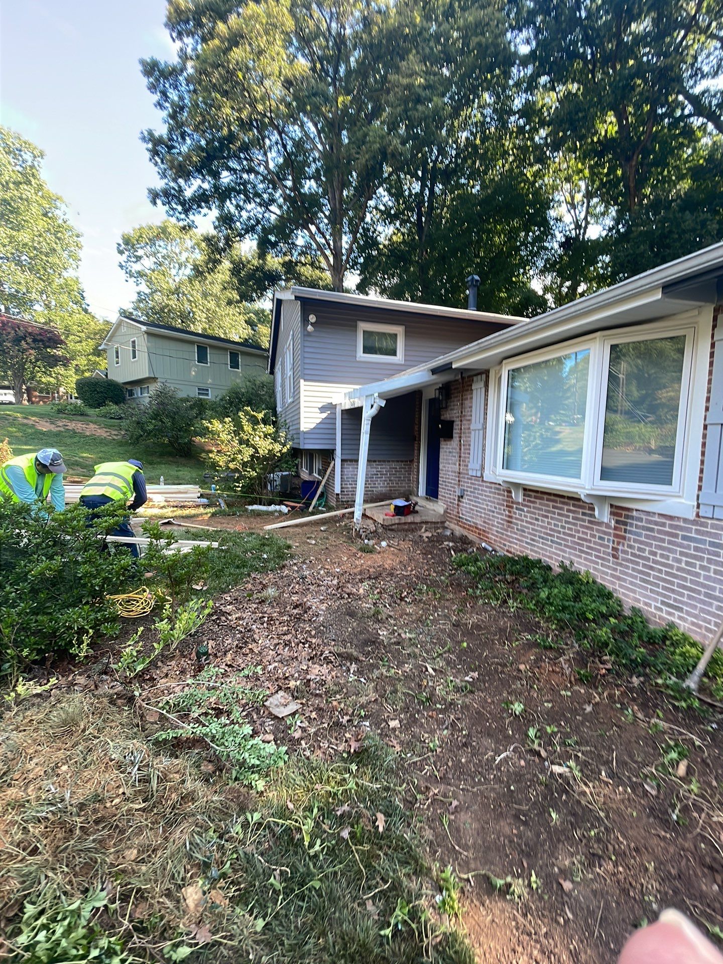 New walkway with stairs and a new front porch by Fairfax Contractors, LLC