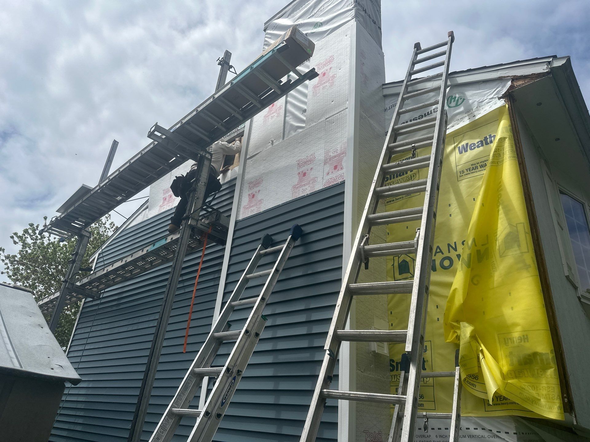 Siding Installation using Certainteed Cedar Impressions Straight Edge Perfection Shingles - D7 - Pacific Blue by A Plus Exterior