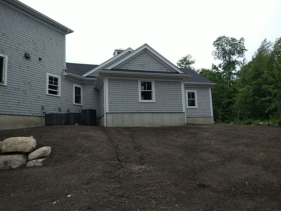 K-Style Gutter Installation with Round Downspouts in Marshfield, MA by Gutter Pro Enterprises