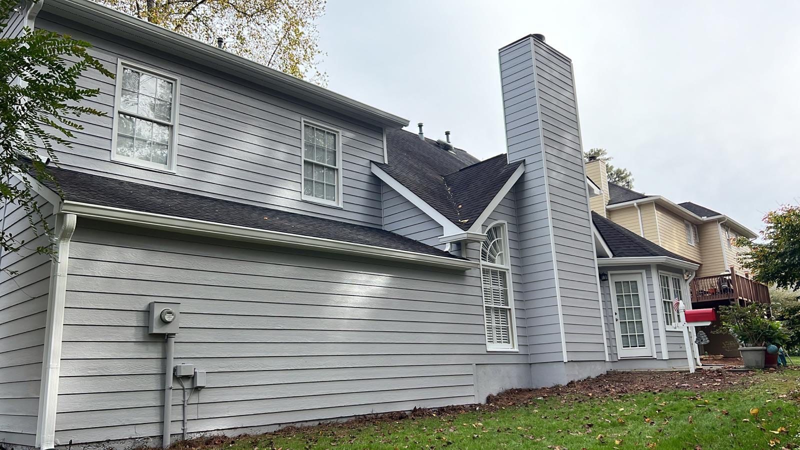 Full Exterior Home and Detached Garage Painting in Kennesaw by Swift Home Renovations 