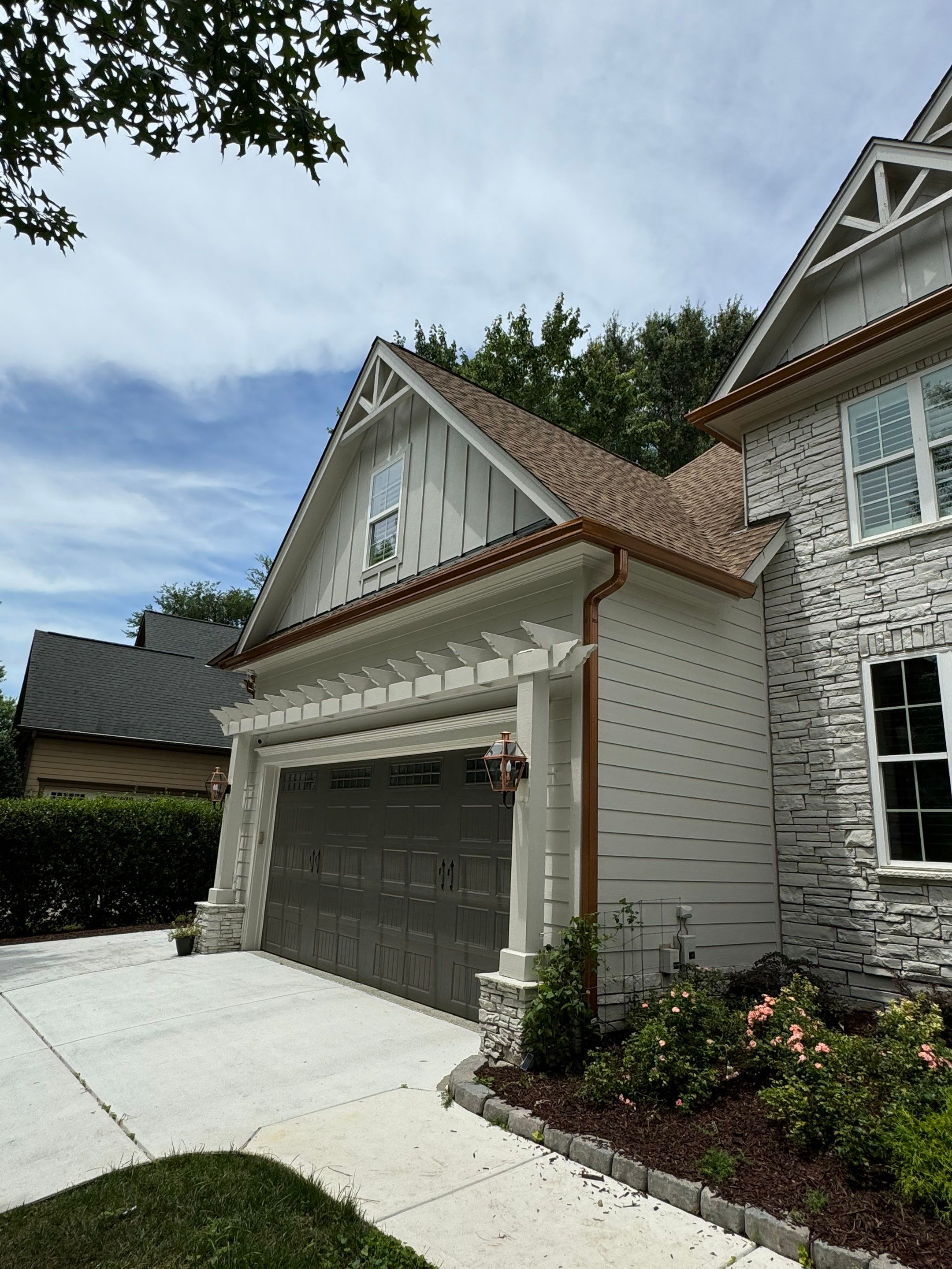 Roof Replacement - GAF Timberline HDZ Shakewood - 6” coppertone seamless gutters by Pro Performance Roofing
