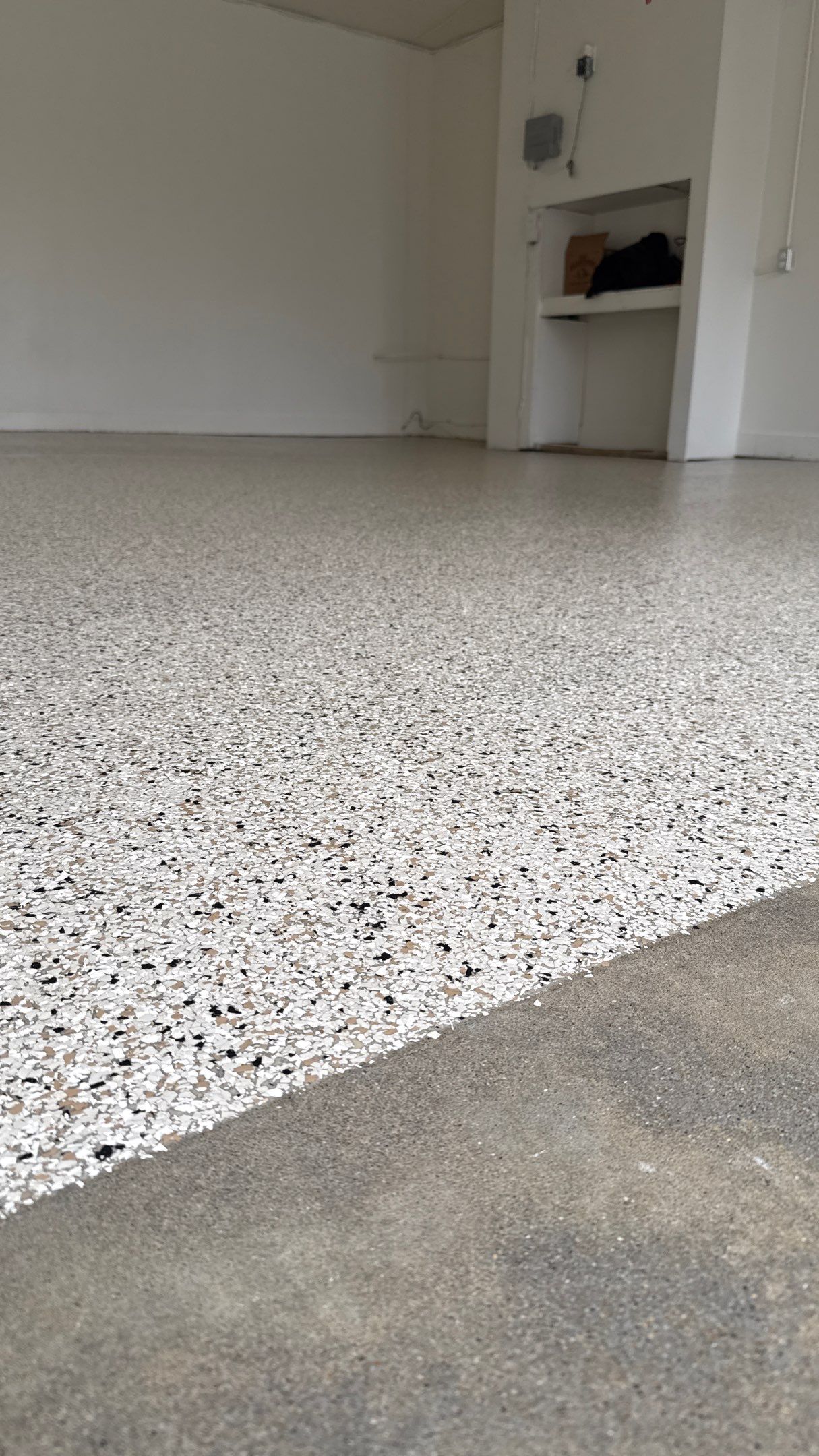 Check Out This Beautiful Shoreline Flake Floor  by Banner Garage