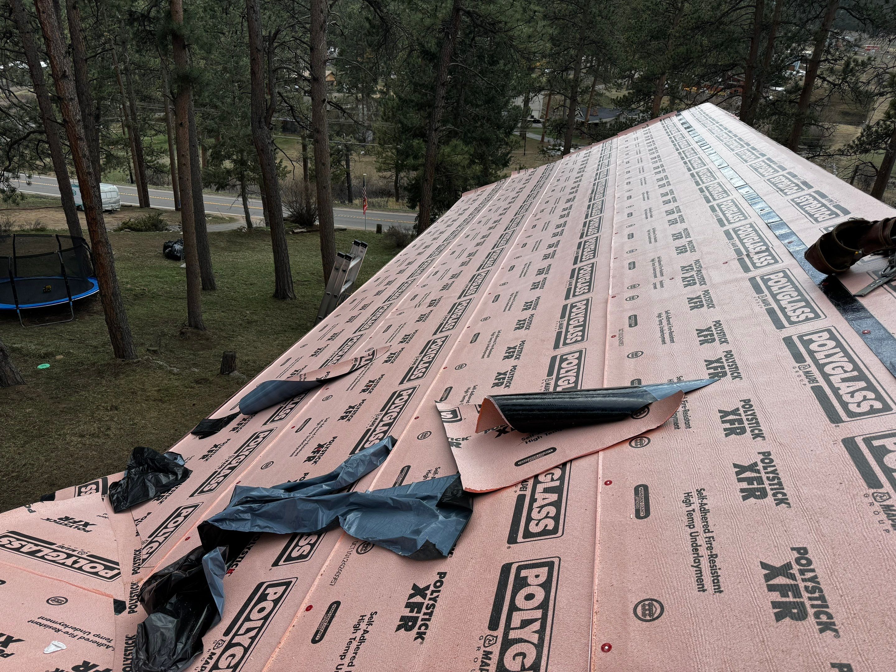 Residential Roofing Installation using Standing Seam Metal by Blue Peaks Roofing LLC 