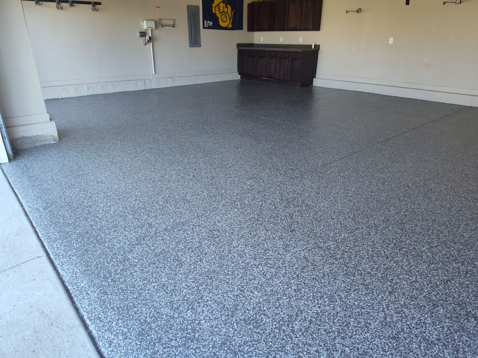 Another Garage Protected from Rock Salt & Chemicals by Revival Concrete Coatings, LLC