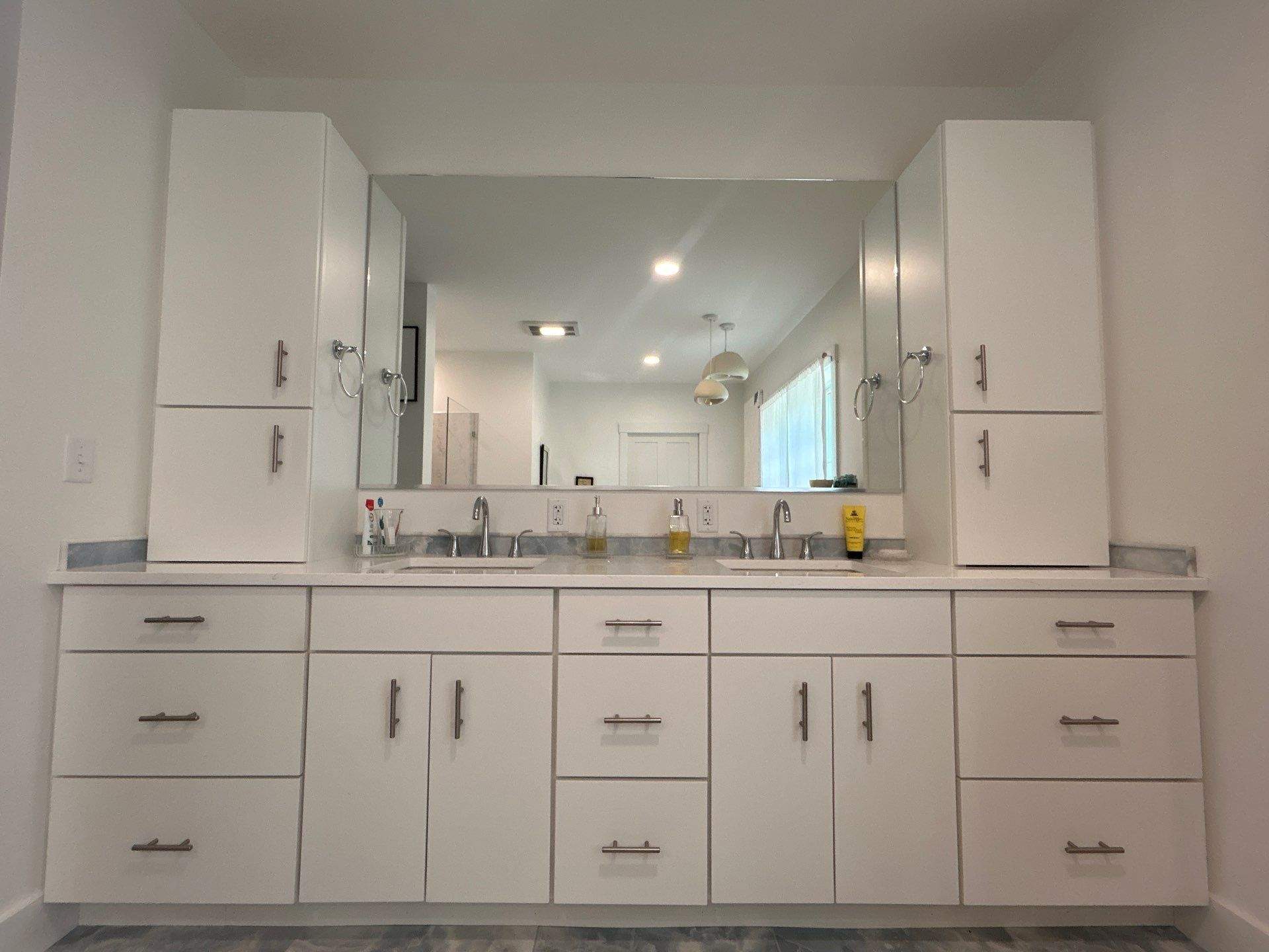 Frameless Showers and Custom Bathroom Mirror by Cheshire Glass Company