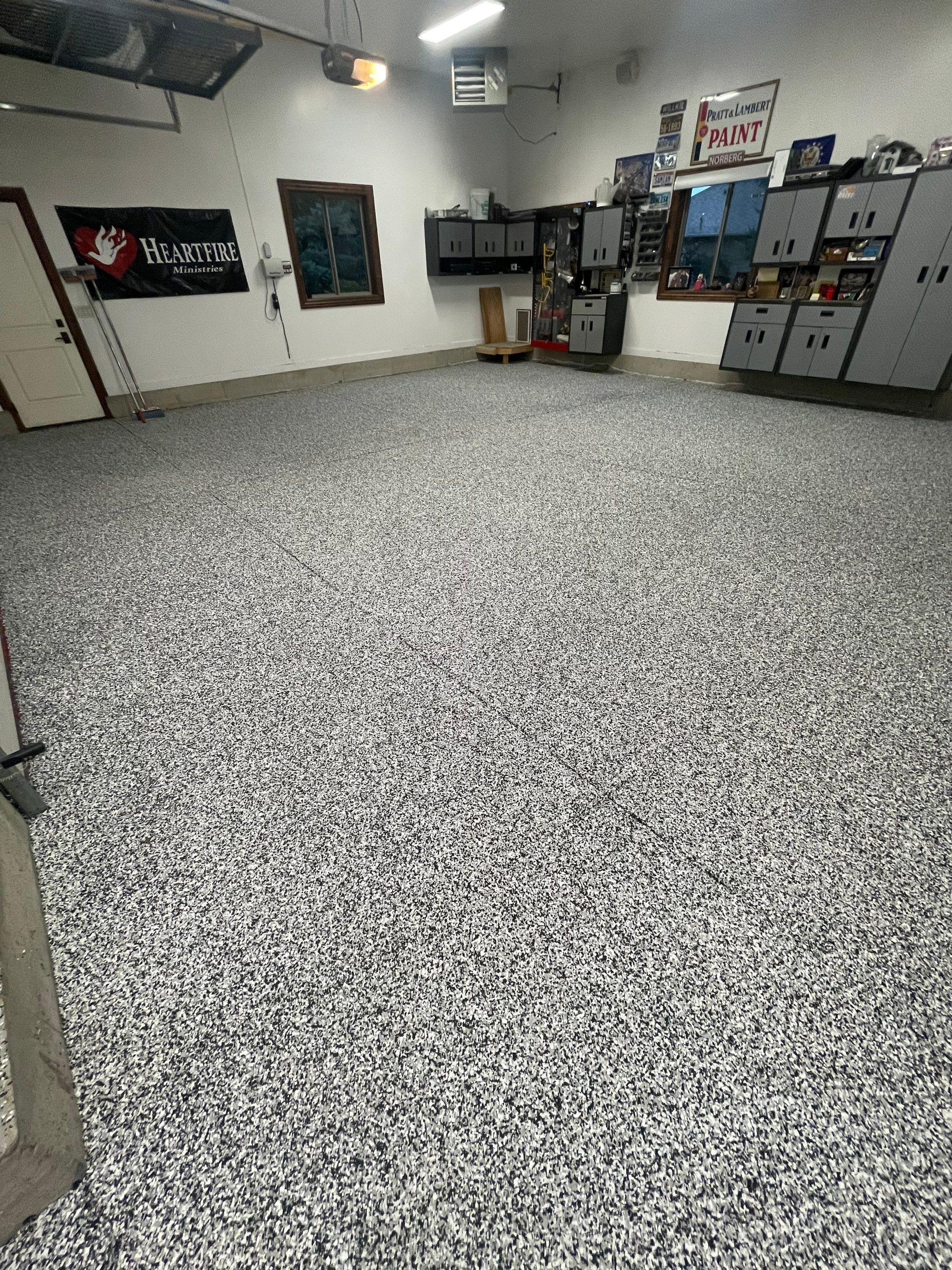 Garage Floor Coating and Domino Flake Finish in Sioux Falls by Select Painting, Coatings & Garage Cabinets