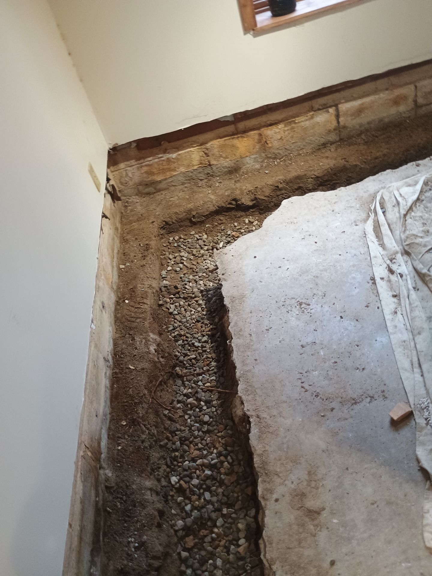 Completing the Connection for Lisa's Drain Tile System by Waterproofing Northeast