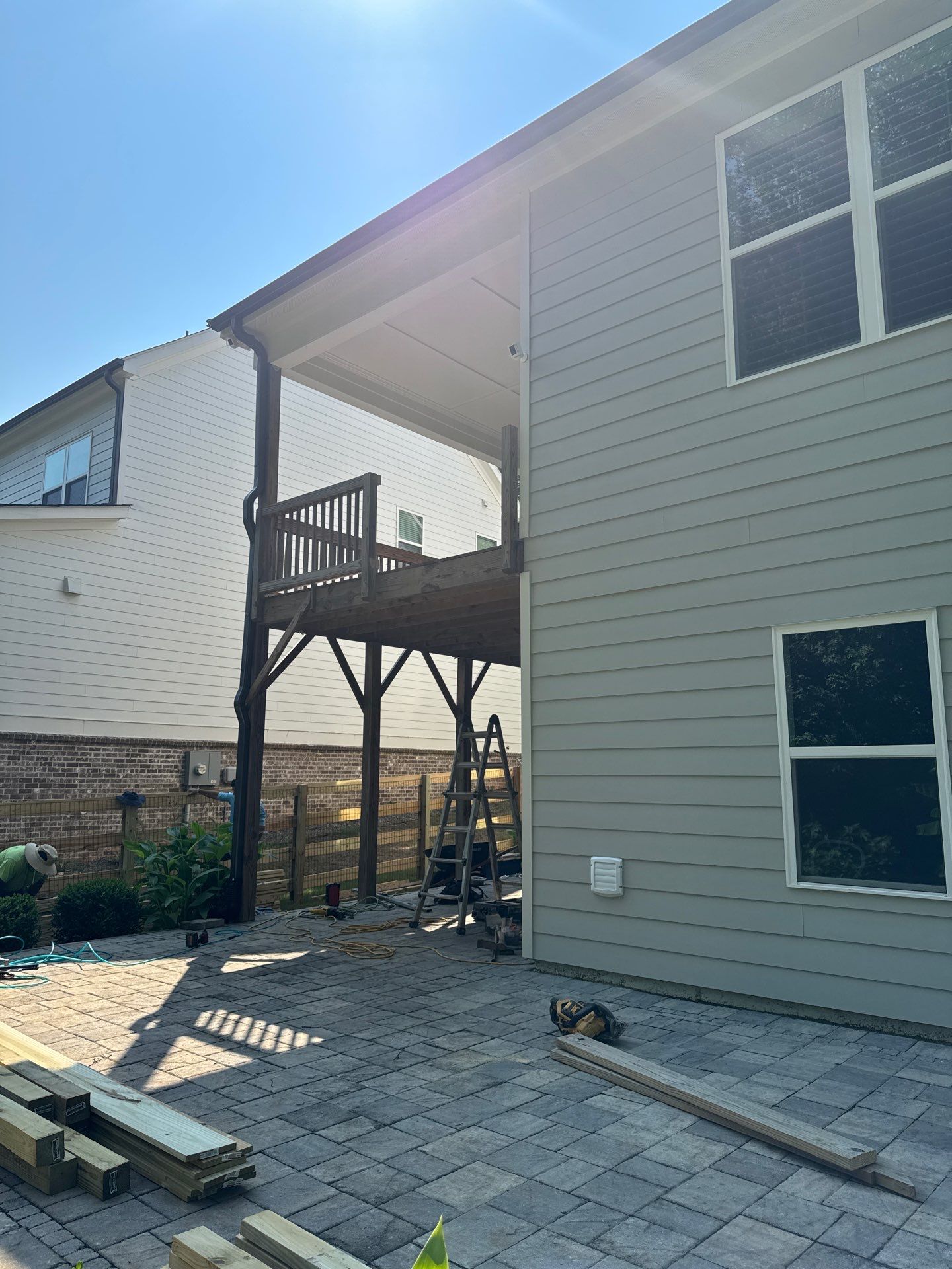 Elevated Deck Stair Construction and Paver Patio in Marietta by Swift Home Renovations