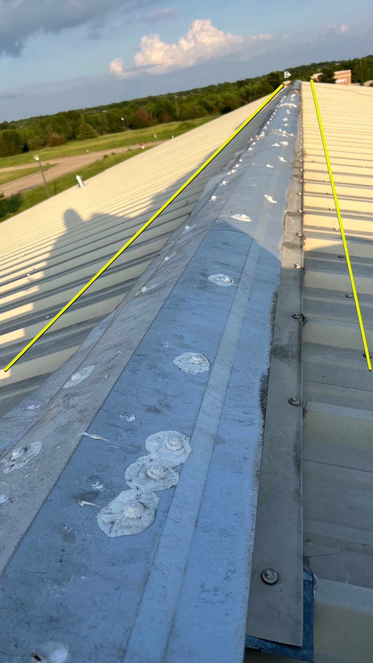 Drainage System Installation and Metal Roof Repairs by Harvey Roofing & Construction