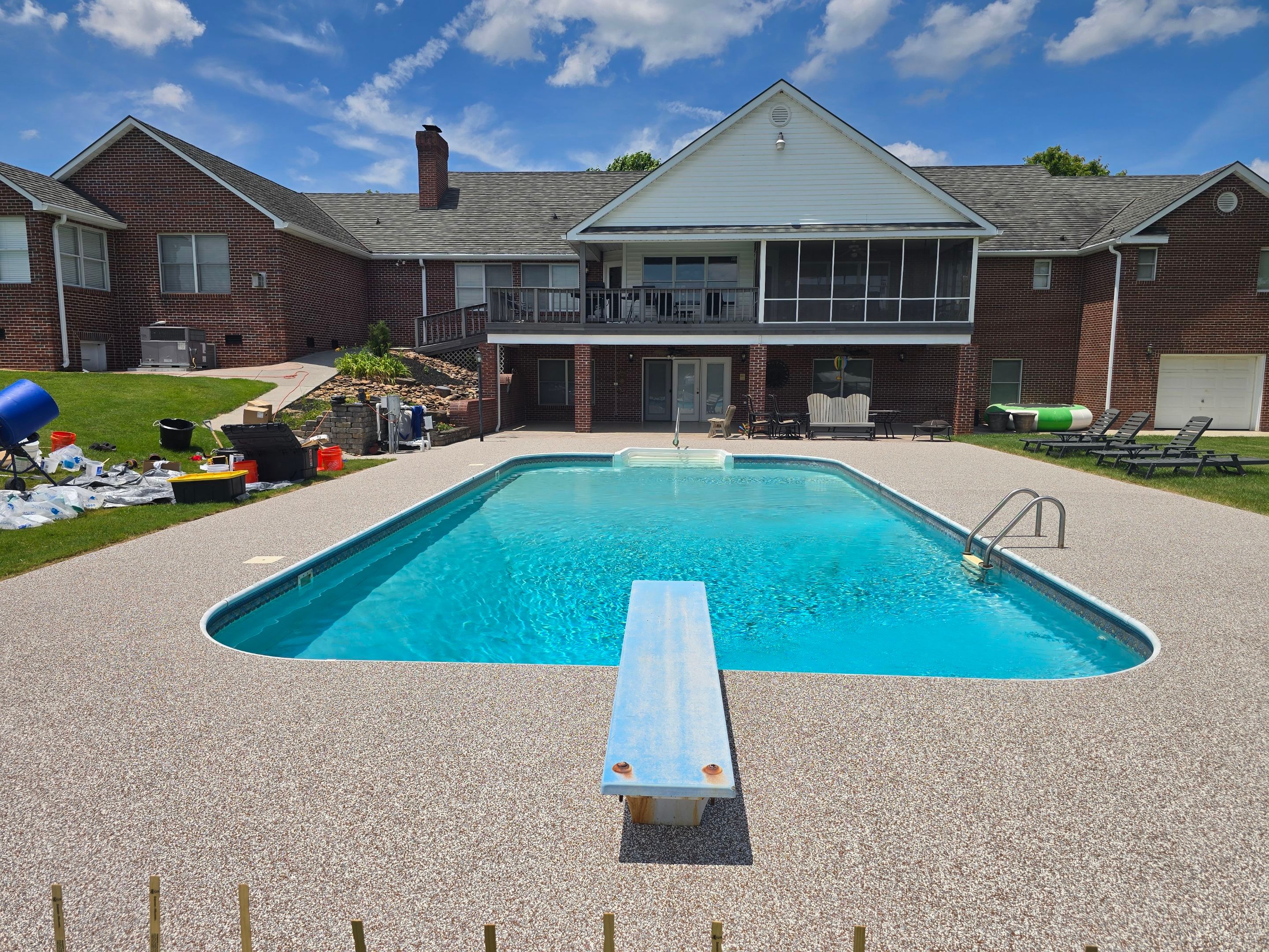 Pool Deck and Porch Using Brownstone and Coldwater Canyon by Elite Floor Solutions