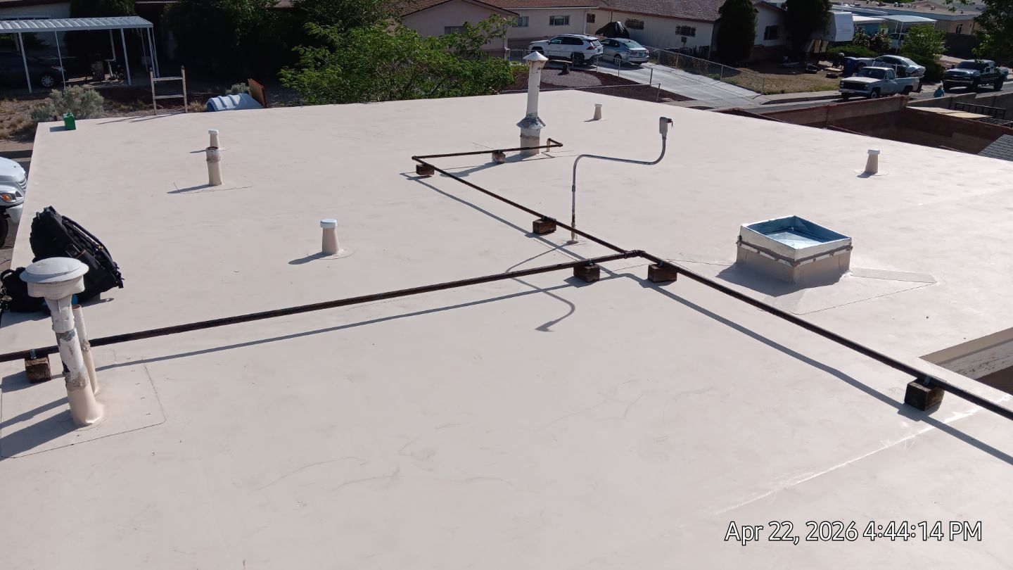 Residential TPO Roof Replacement and skylight replacement in Albuquerque by Doyle Roof Masters Inc