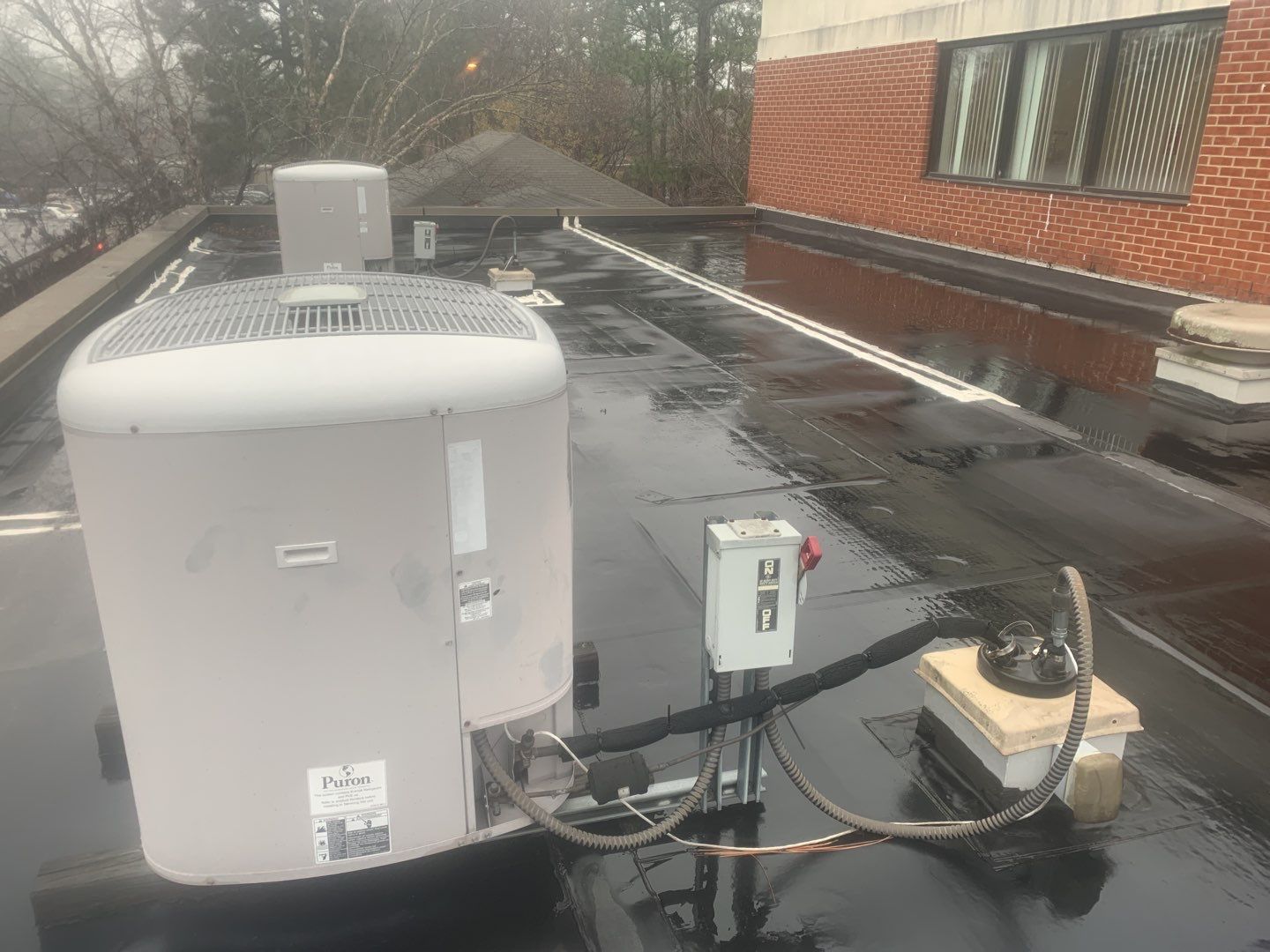 Re Roof (TPO) by American Roofing NC