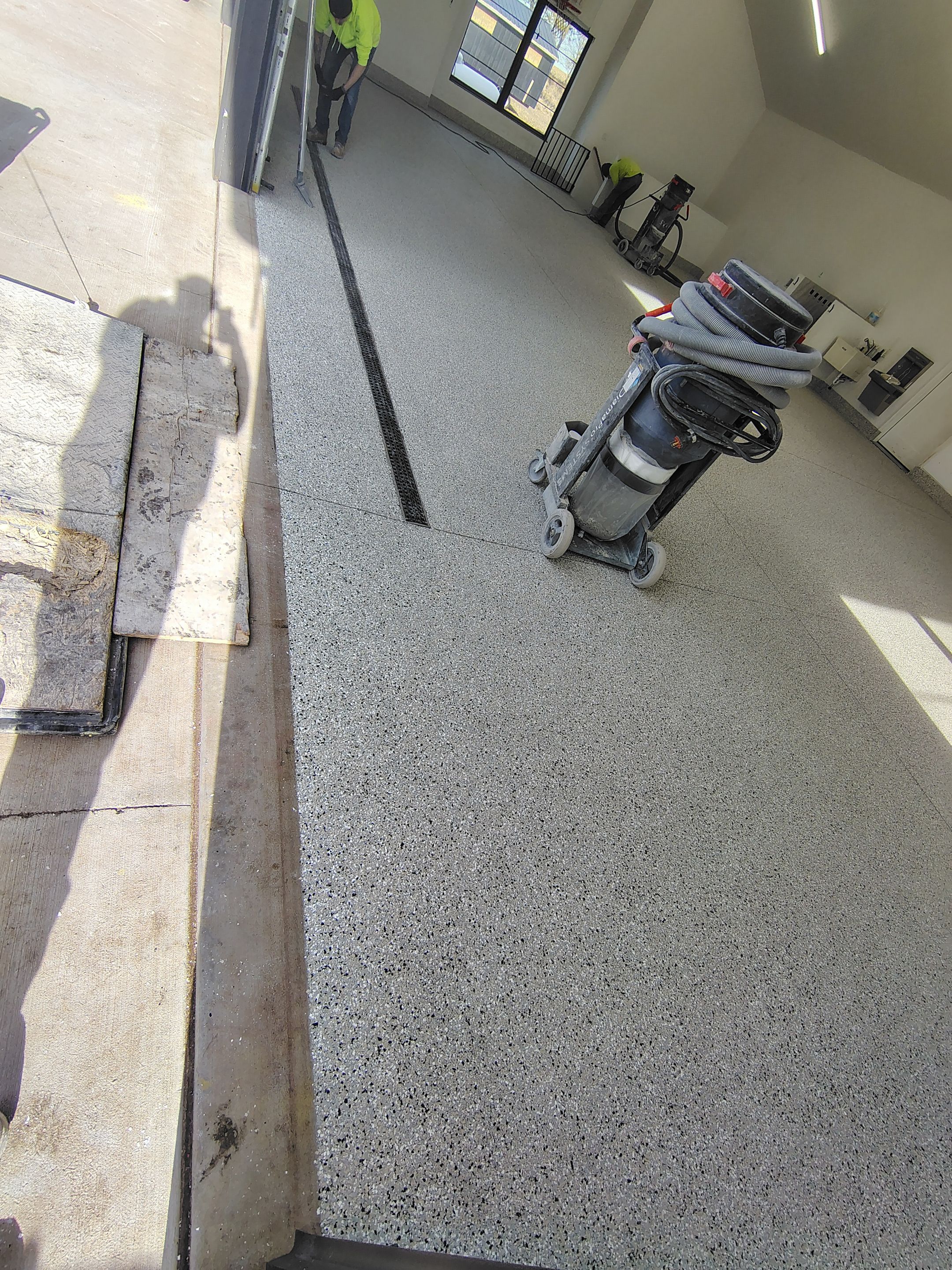 Epoxy Flake Garage Floor and Stair Coating in Sioux Falls by Select Painting, Coatings & Garage Cabinets