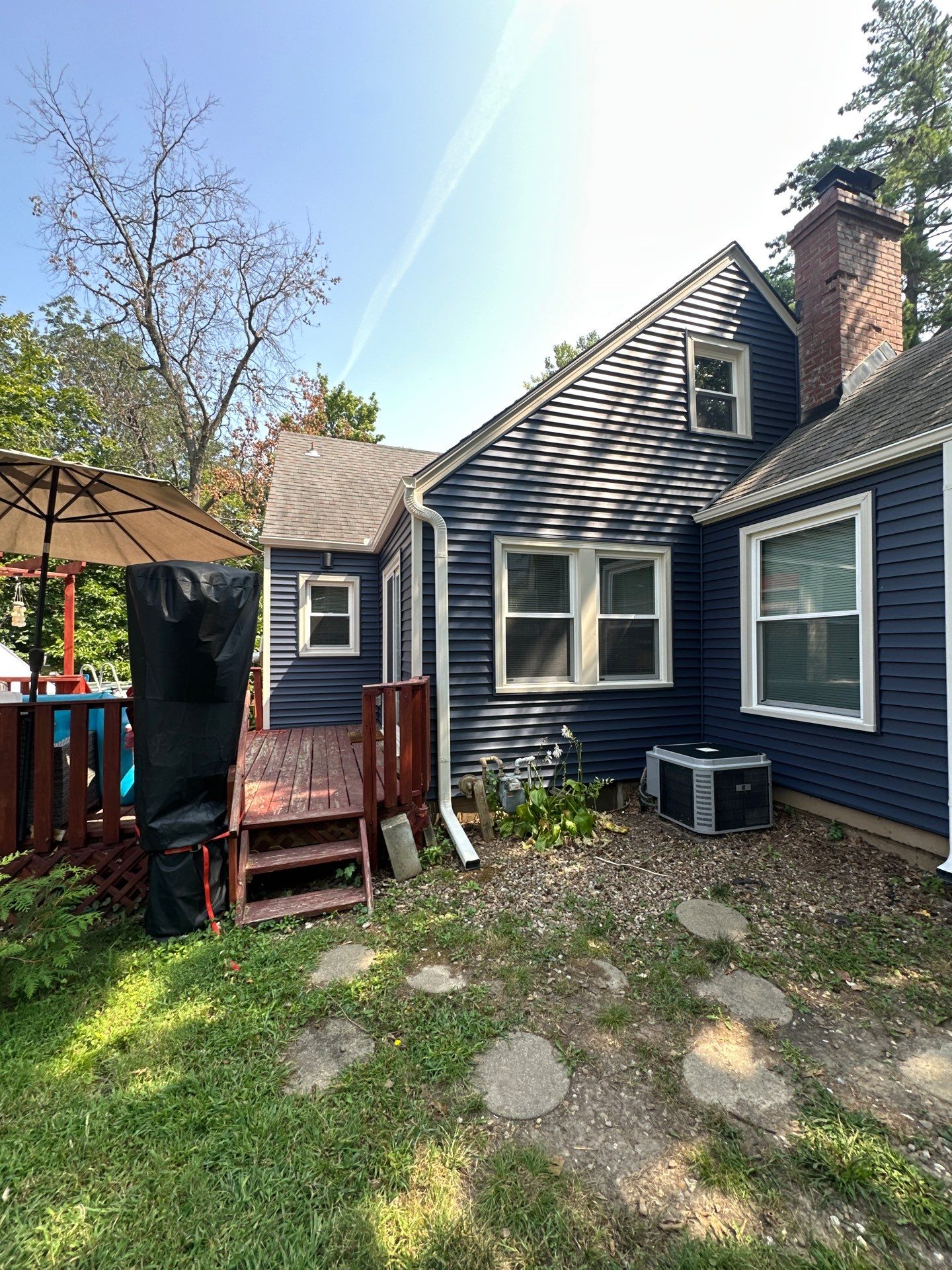 Kansas City Indigo Insulated Craneboard Siding and Window Replacement Project in Kansas City by EEC Windows, Siding & Roofing