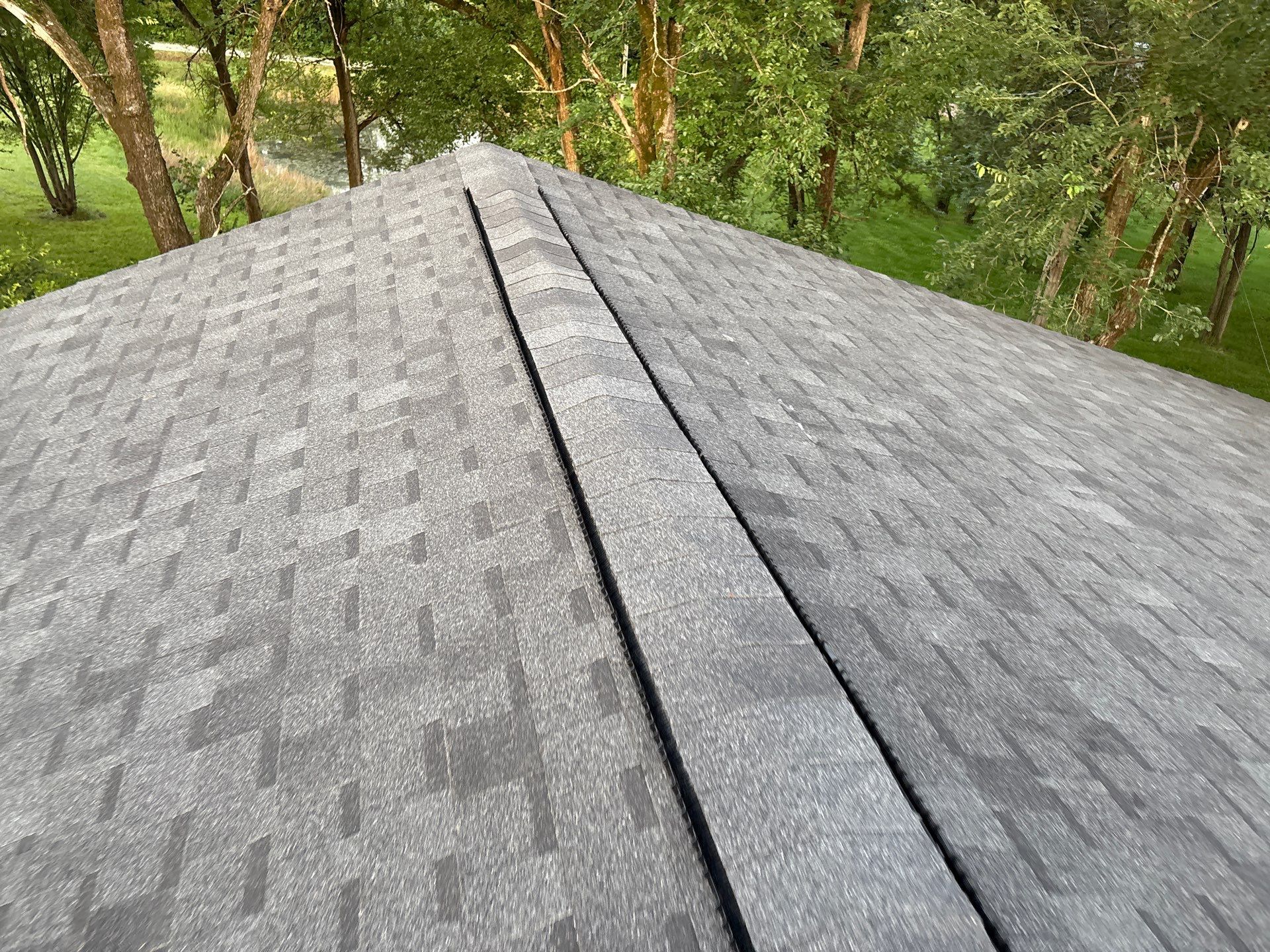 Residential Roof + Gutters & Downspouts Install  by Titan Commercial & Residential Roofing 