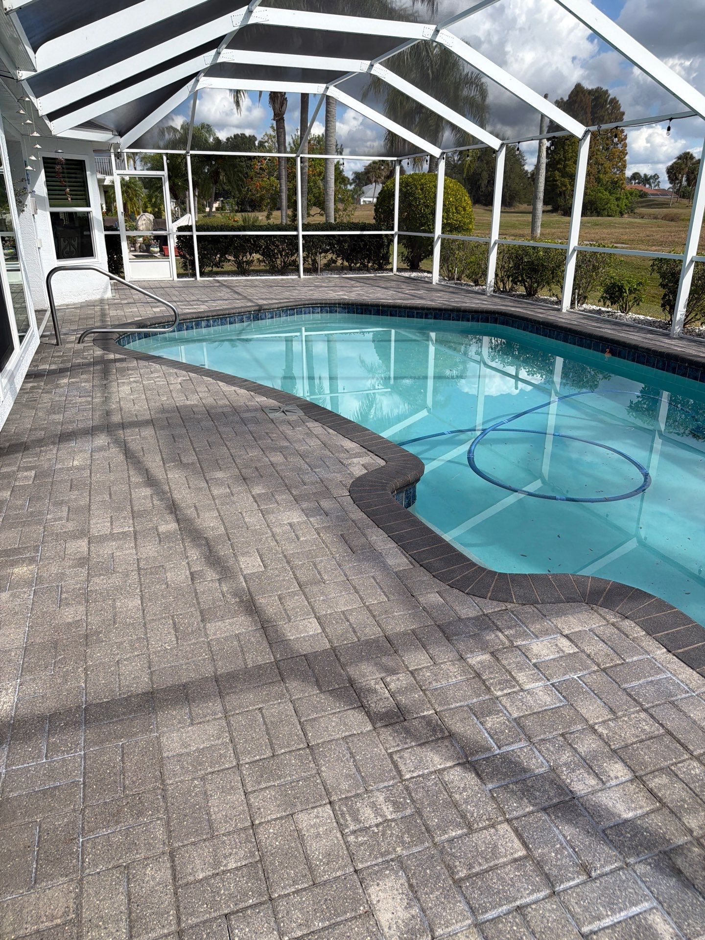 Paver Sealing for Screened Pool Deck in Sun City Center by Supreme Paver Experts