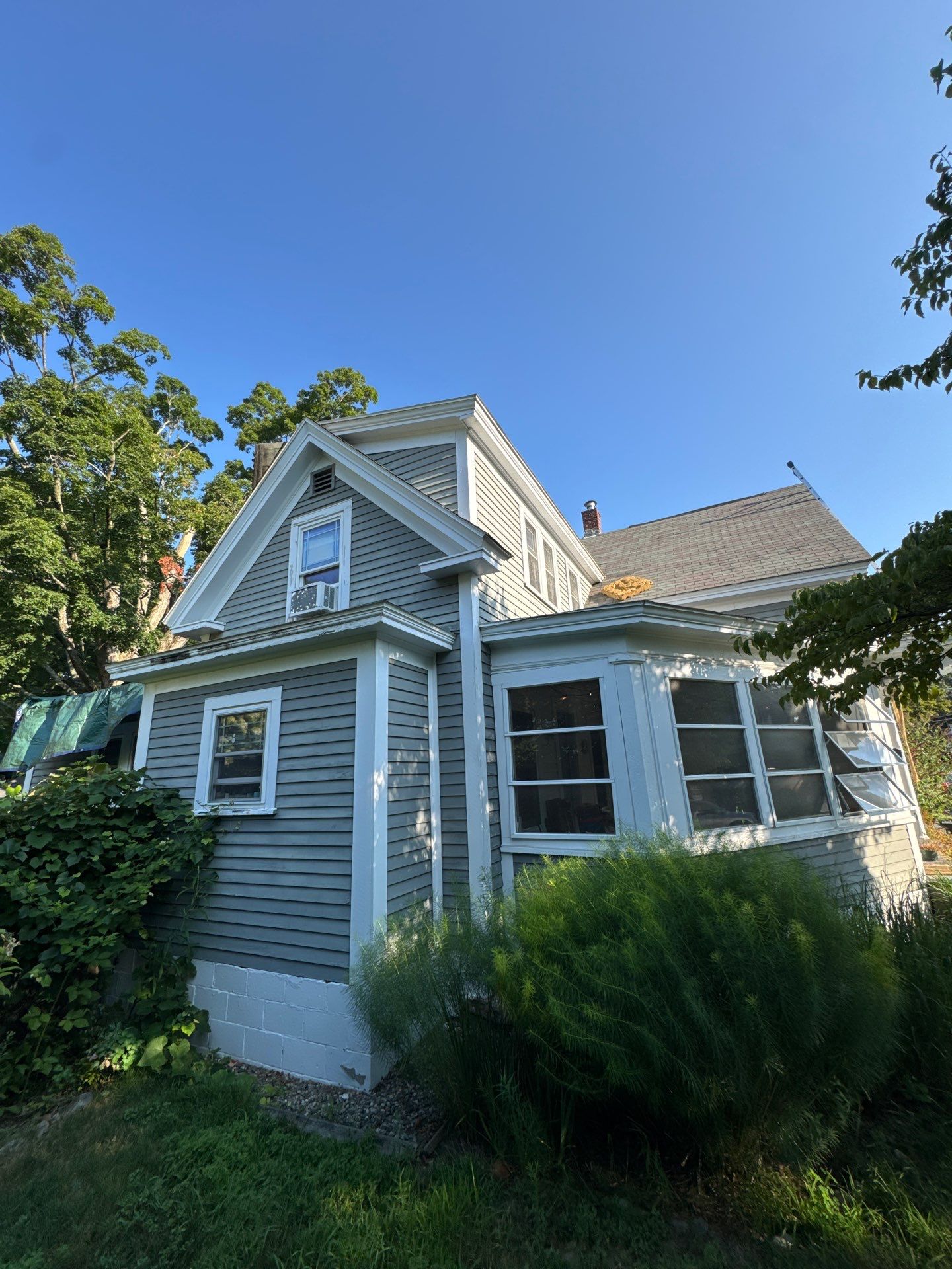 Full Roof Replacement + Custom Gutter Install | Onyx Black Finish by Mighty Dog Roofing of Greater Middlesex County
