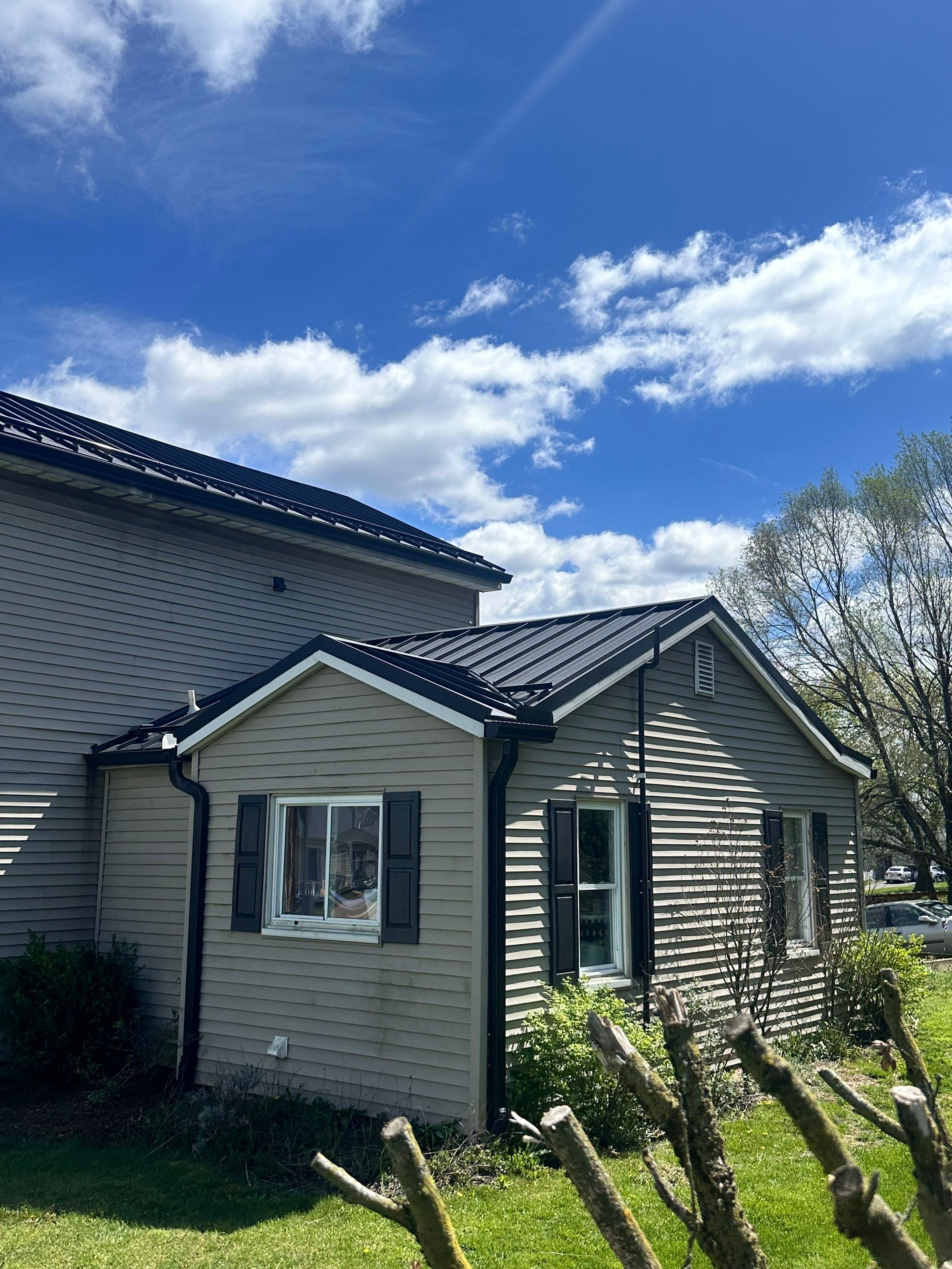Residential Roofing Installation using Texture Standing Seam by Teflon Roofing