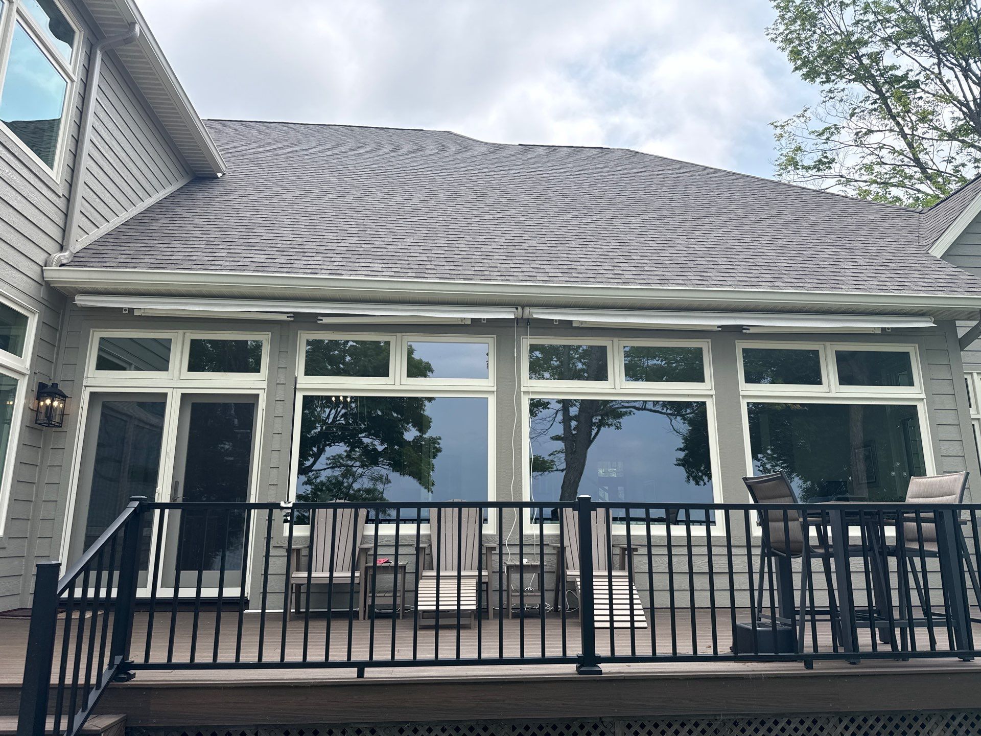 Sunesta Retractable Awning Installation for Sault Sainte Marie Lakeside Deck by Rainbow Seamless Systems
