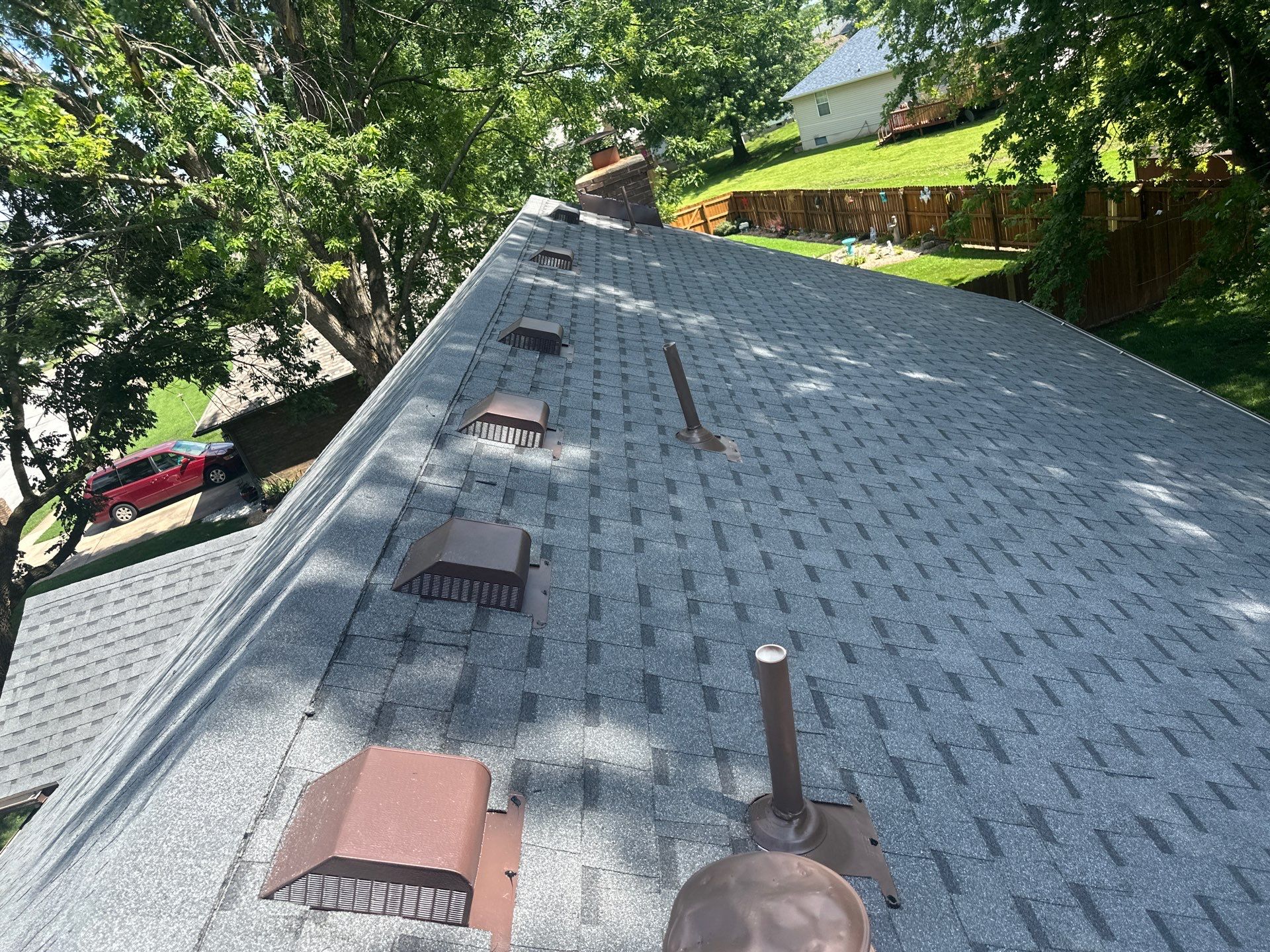 Residential Roof + Gutters & Downspouts Install  by Titan Commercial & Residential Roofing 